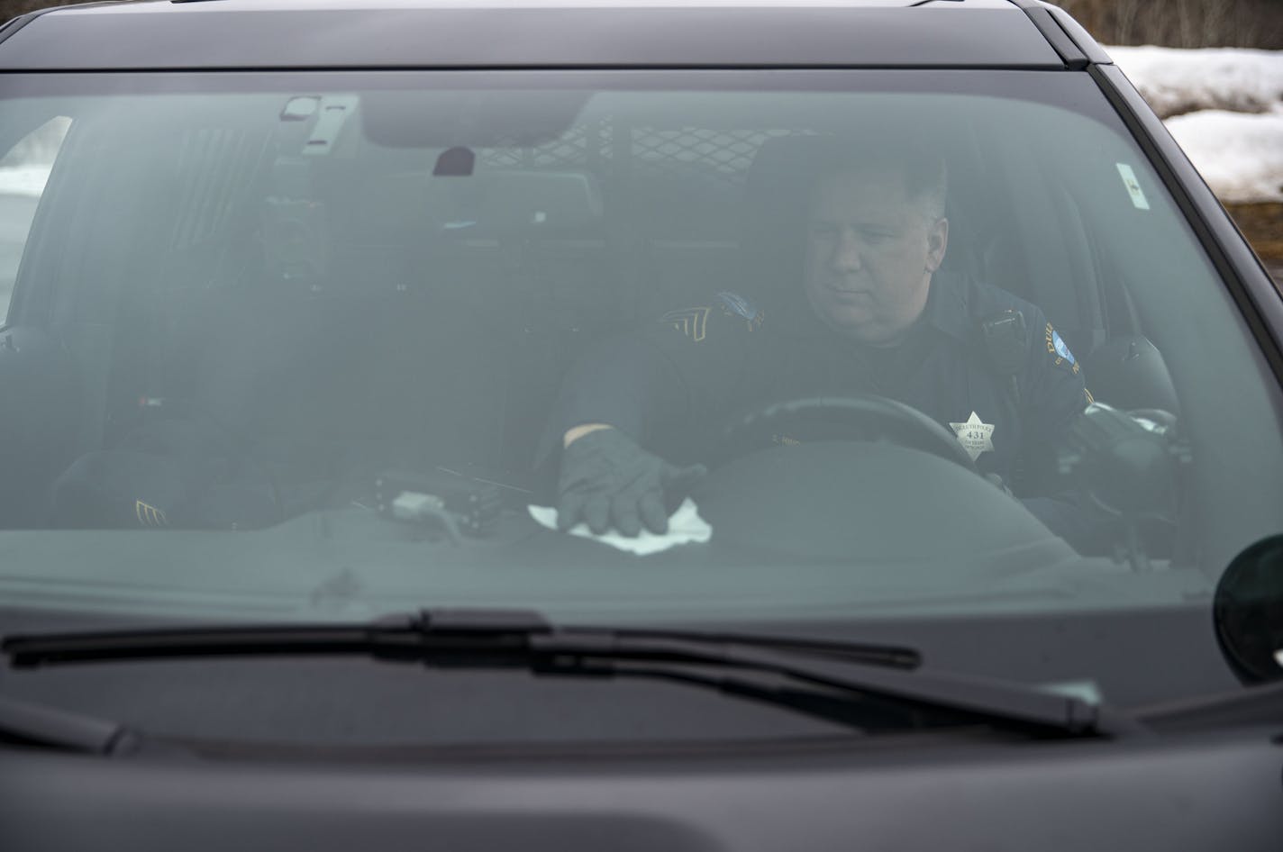 Duluth police sergeant Steven Ring disinfected his squad car after his shift on Thursday. ]
ALEX KORMANN &#x2022; alex.kormann@startribune.com The Duluth Police Department has taken special measures to help protect their officers and the public from COVID-19 including disinfecting all squad cars at the start and end of every shift.