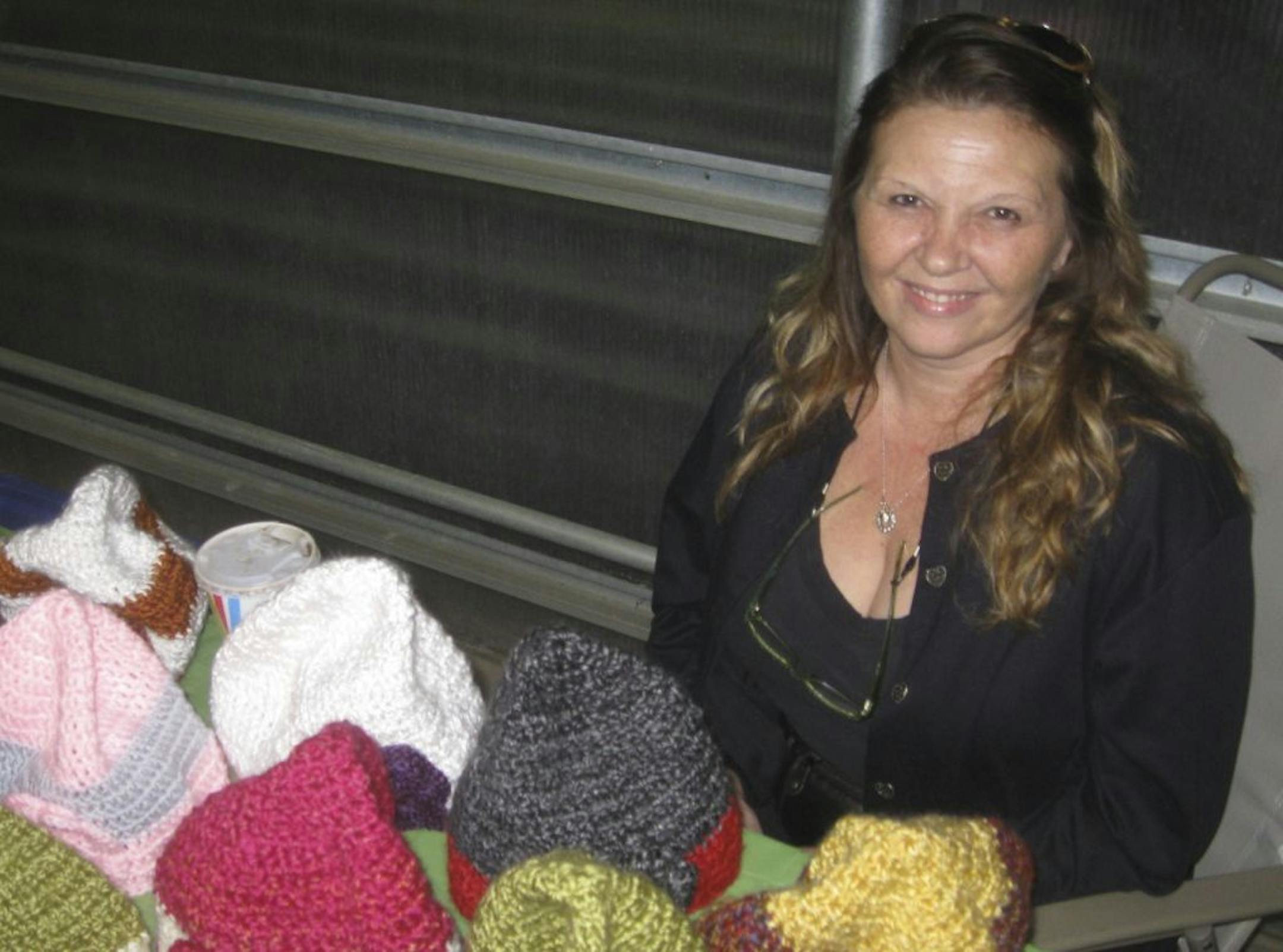 Cherie Wiltse of Hookin� Hats in Shakopee sold crocheted caps at a recent ladies night shopping event at the Mustard Seed in Chaska.