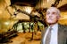 January 31, 1992 Bruce Erickson, curator of paleontology examined the new Diplodocus, Allosaurus and Camptosuarus exhibit at science Museum of Minneso