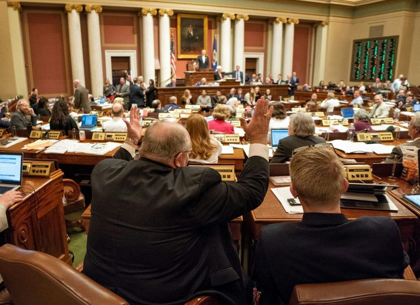 Republican Tax Chairman Rep. Gregory Davids threw his hands in the air as his bill passed 90-38.