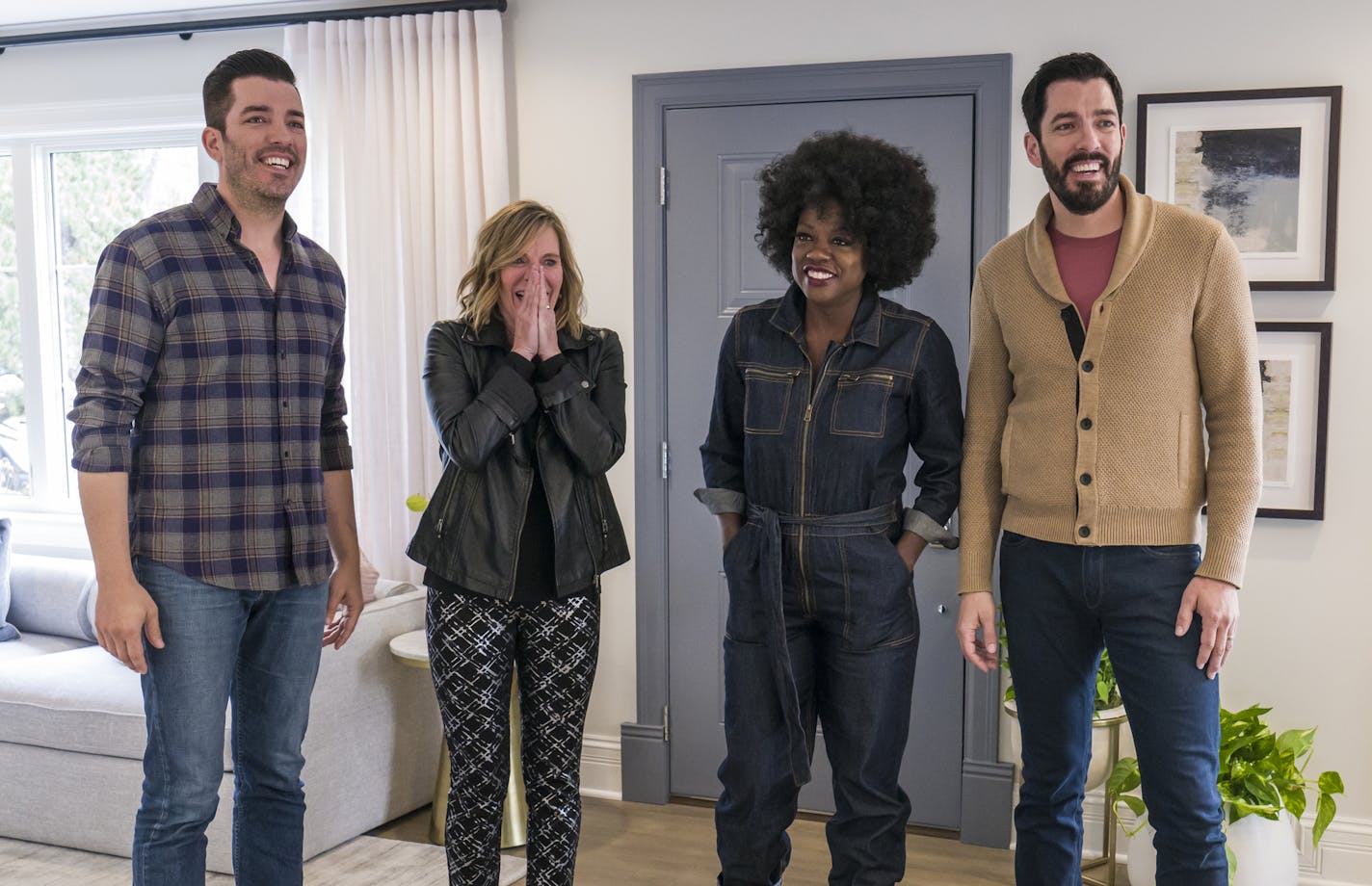 On "Celebrity IOU," Jonathan Scott, Michelle O'Neill, Viola Davis and Drew Scott take part in the big reveal of O'Neill's remodeled home.