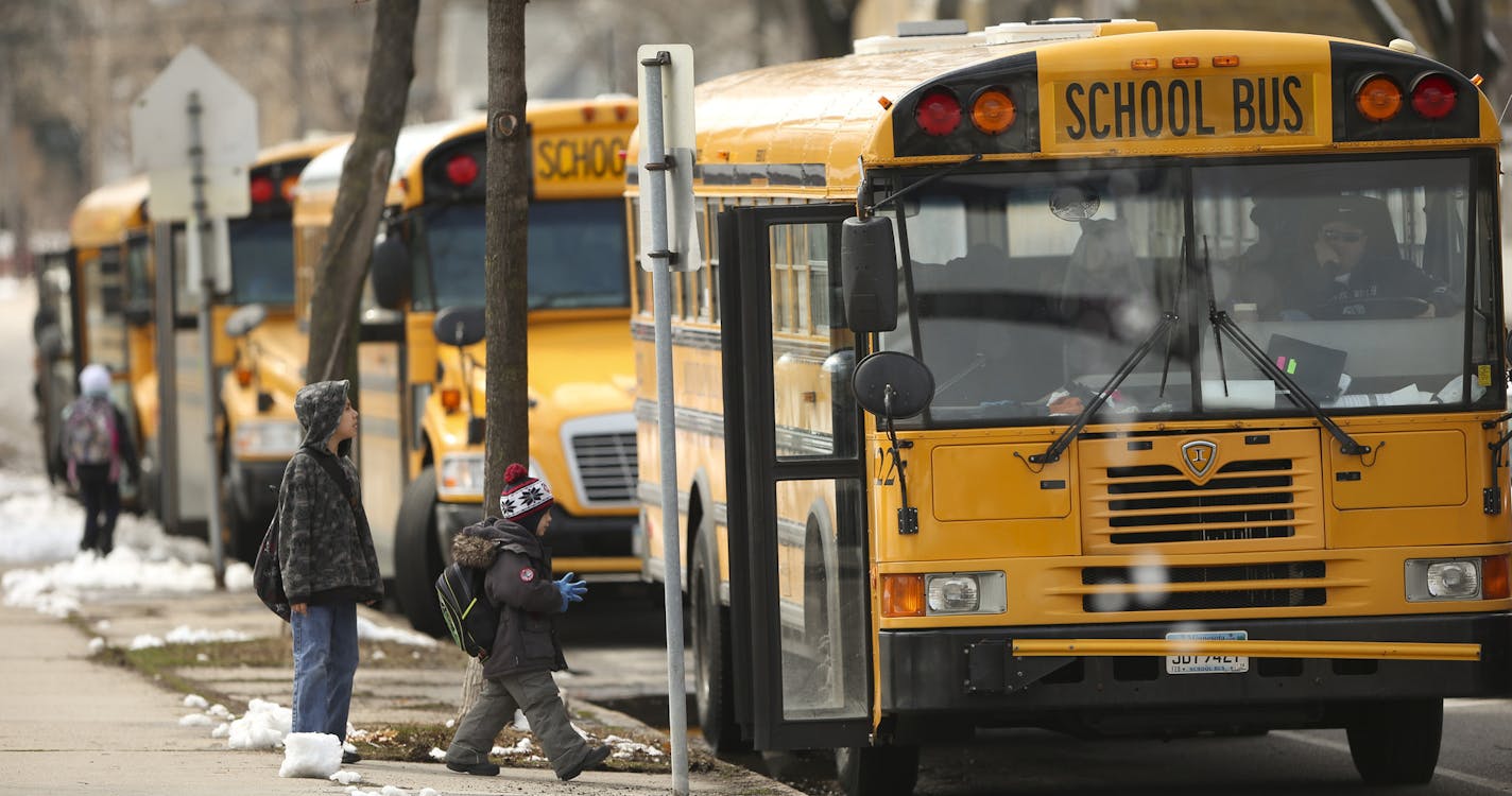 Unless Minnesotans get serious about giving up backyard fires, old lawn mowers and diesel buses the state could face costs of up to $240 million a year to meet clean air requirements imposed by the federal government. In order to prevent that, a group of environmental and businesses have banded together to come up with a preemptive plan to be announced Wednesday. At Hiawatha Community School in Minneapolis Tuesday afternoon, April 23, 2013, the kids board school buses that have been retrofitted