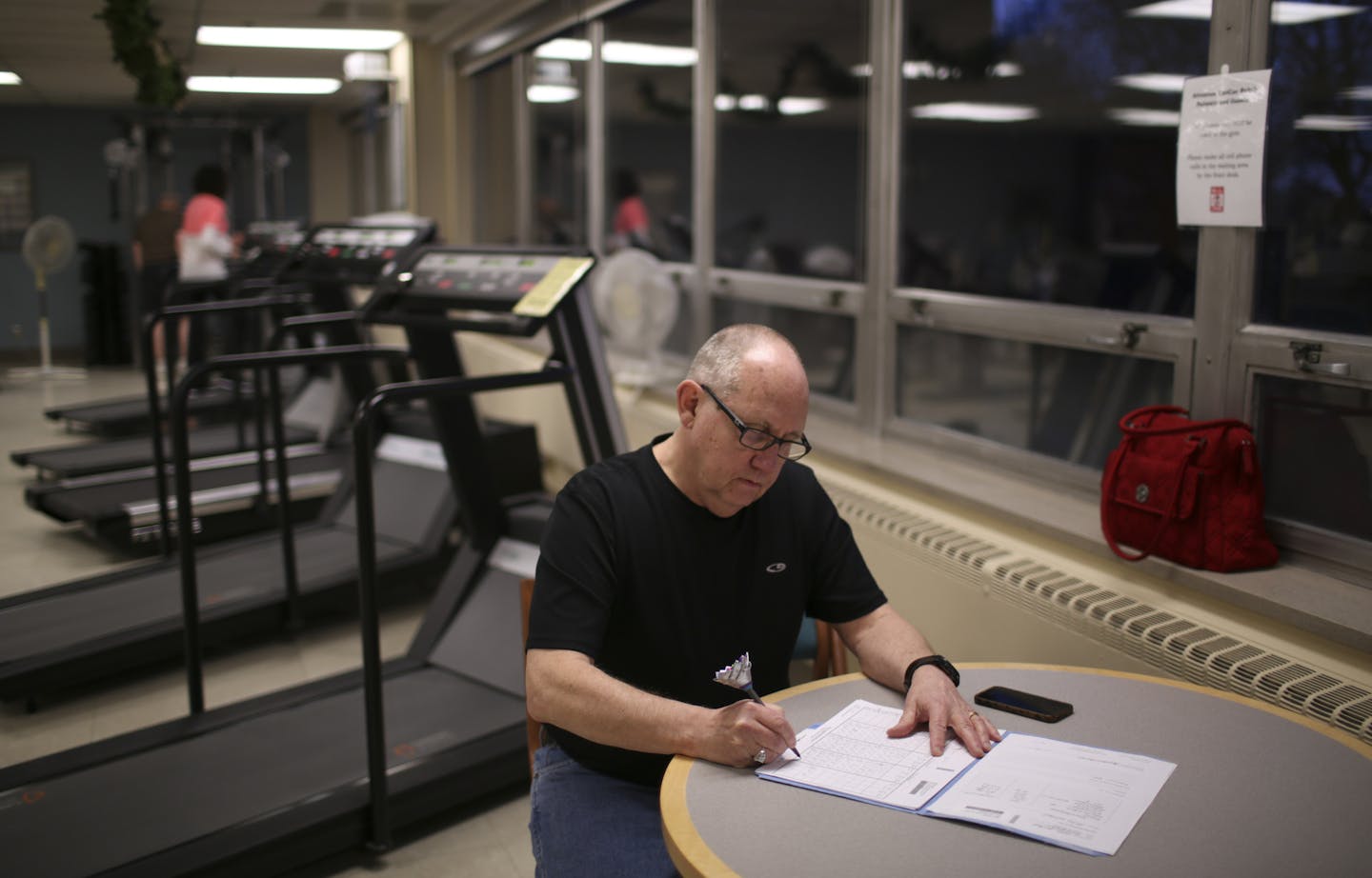 Mike McKee made notes of his workout after he finished walking on a treadmill in the cardiac rehabilitation clinic at the University of Minnesota Medical Center, Fairview Monday evening. ] JEFF WHEELER &#x201a;&#xc4;&#xa2; jeff.wheeler@startribune.com Mike McKee was walking about 8 miles a day when he collapsed from a heart attack in 2008. A defibrillator and a stent got him back on the road until last year, when clogged arteries in his legs caused severe pain. Now, he's enrolled in a special ex