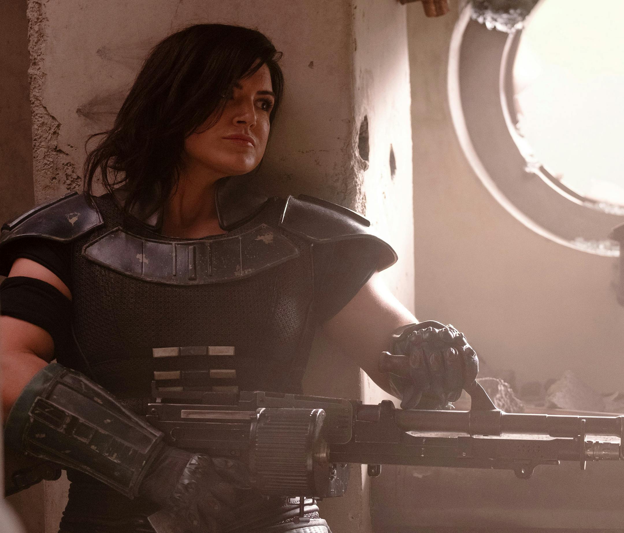 This image released by Disney Plus shows Gina Carano in a scene from "The Mandalorian." The ambitious eight episode show with the budget of a feature film is one of the marquee offerings of the Walt Disney Co.’s new streaming service, Disney Plus, which launches Nov. 12. (Melinda Sue Gordon/Disney Plus via AP)