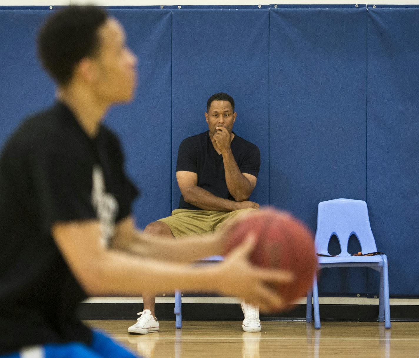 Richard Coffey — former Gopher, Timberwolf and paratrooper — watched as son Amir worked on his shot. Richard’s diligent workouts also helped Amir’s sisters, Sydney and Nia, become college players.