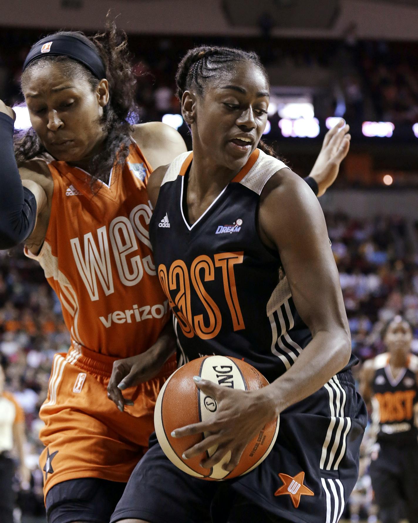 Western Conference's Maya Moore, left, of the Minnesota Lynx, tries to avoid running into Eastern Conference's Tiffany Hayes, of the Atlanta Dream, during the second half of the WNBA All-Star basketball game Saturday, July 22, 2017, in Seattle. The West won p130-121. (AP Photo/Elaine Thompson)