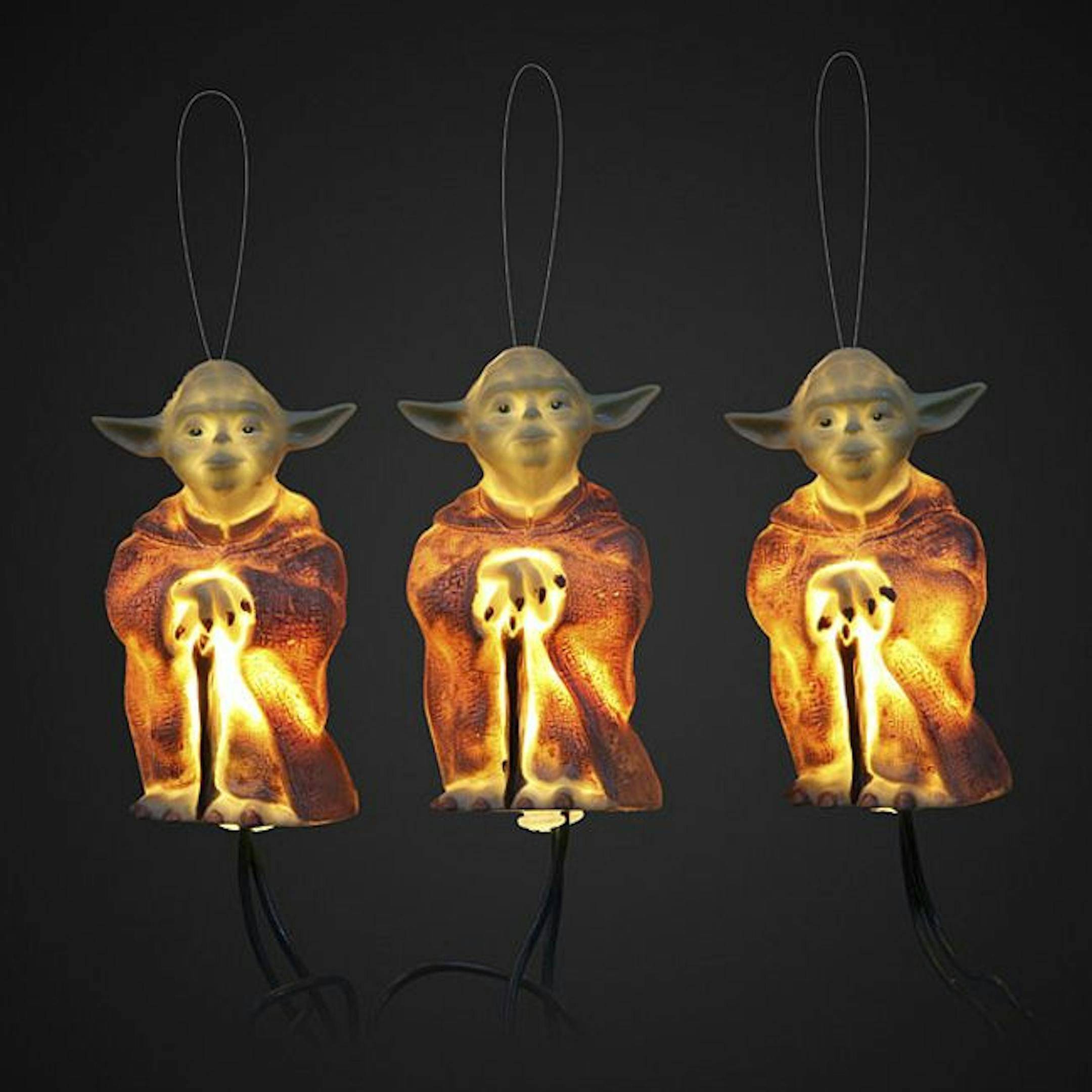 These "Star Wars" holiday lights feature glowing Yodas.