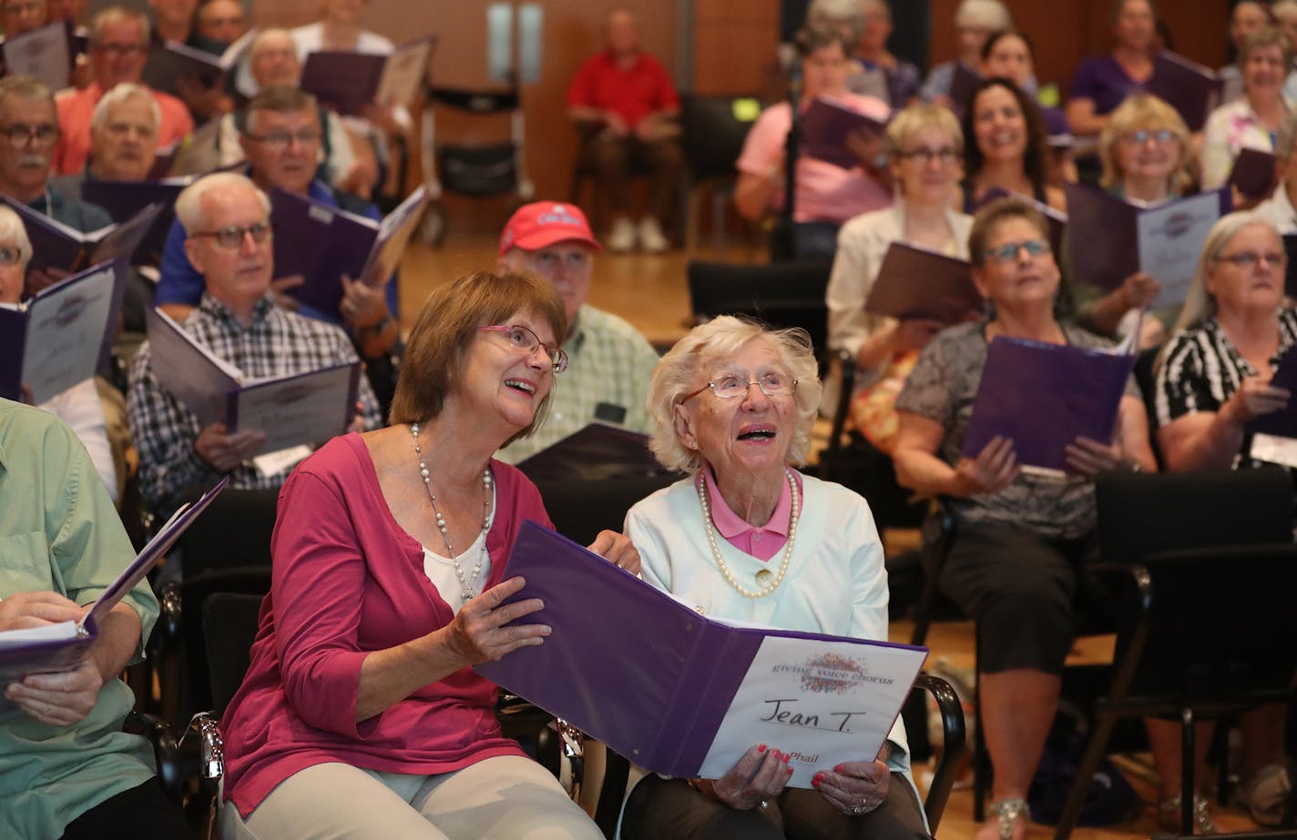 Rehearsal for "Love Never Forgets," a new choral composition for Giving Voice, a choir specifically for Alzheimer's patients and their caregivers.
Here, Giving Voice choir members Jean Thomson, front left to right, and her mom Evelyn Thomson, 99, during rehearsal Wednesday, May 23, 2018, at MacPhail Center for Music in Minneapolis, MN.] DAVID JOLES &#xef; david.joles@startribune.com "Love Never Forgets" is a new composition for Giving Voice, a Twin Cities choir for Alzheimer's patients and their