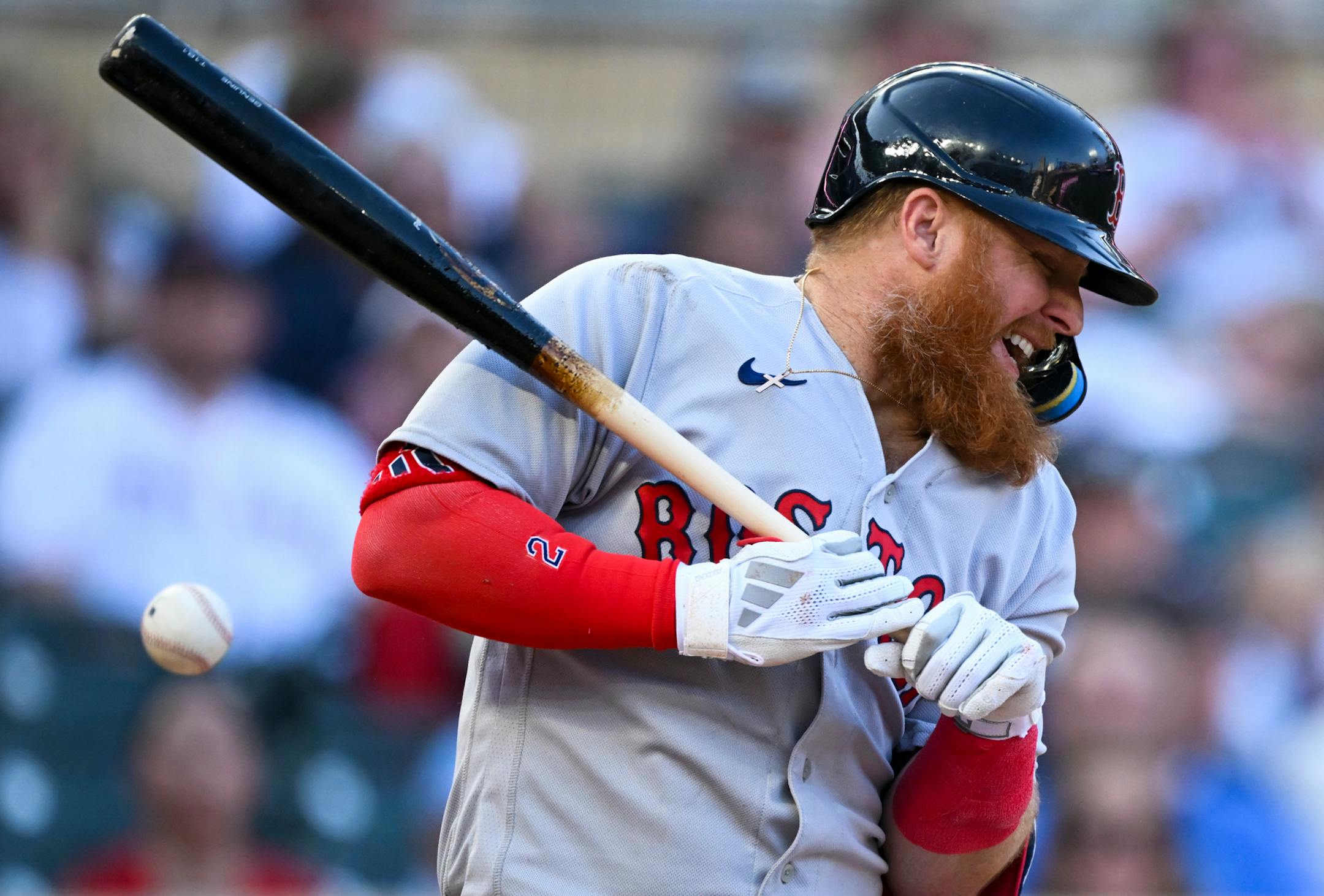 Boston Red Sox designated hitter Justin Turner (2) is hit by a pitch thrown by Minnesota Twins starting pitcher Bailey Ober (17) in the top of the fifth inning Tuesday, June 20, 2023, at Target Field in Minneapolis, Minn.