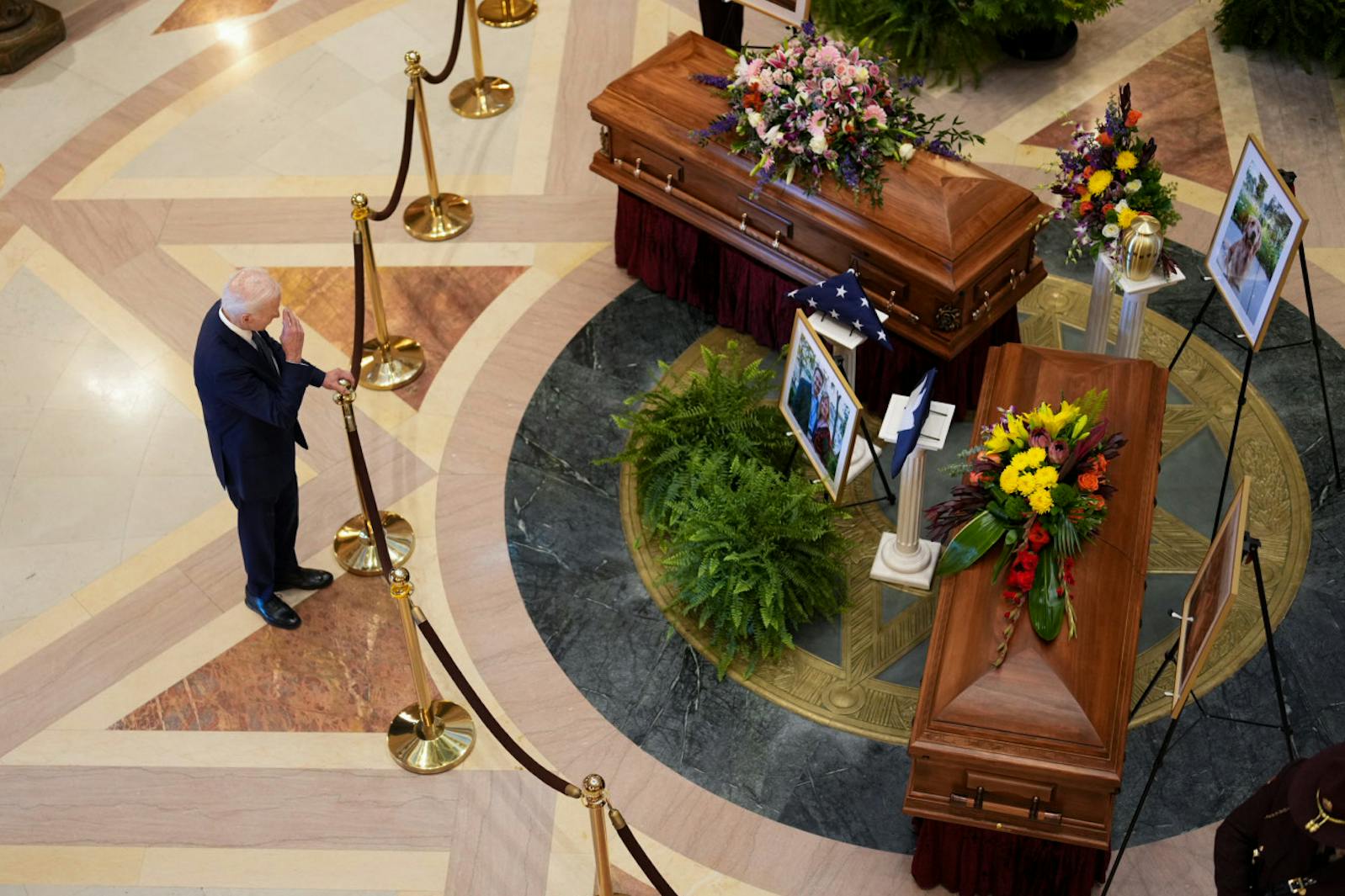 Former President Joe Biden visits the coffins of Minnesota State Representative Melissa Hortman, Mark Hortman and their dog, Gilbert, during at the Minnesota State Capital in St. Paul, Minn. on Friday, June 27, 2025.  [ALEX KORMANN • Alex.Kormann@startribune.com]
