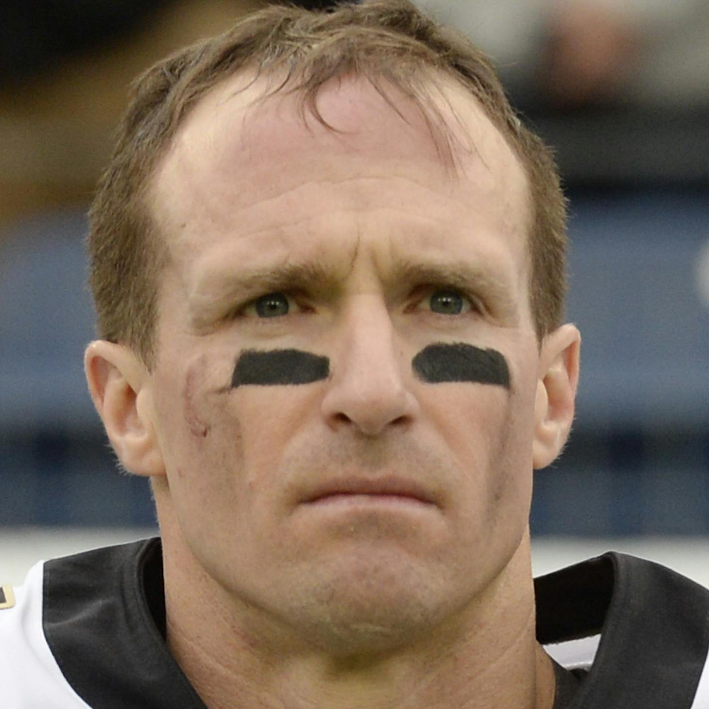 New Orleans Saints quarterback Drew Brees stands for the national anthem before the first half of an NFL football game between the Saints and the Tennessee Titans Sunday, Dec. 22, 2019, in Nashville, Tenn. (AP Photo/Mark Zaleski)