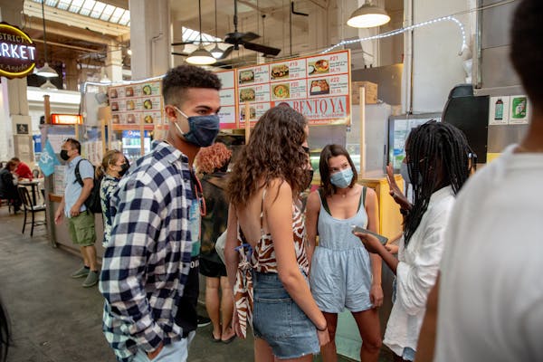 Patrons wore face masks at the Grand Central Market in downtown Los Angeles on June 8, 2021. The director of the Centers for Disease Control and Preve
