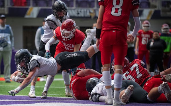 Beau Wiersma of Kingsland dives in the end zone for a second quarter touchdown Thursday November16,2023 in, Minneapolis, Minn. ] JERRY HOLT • jerry.