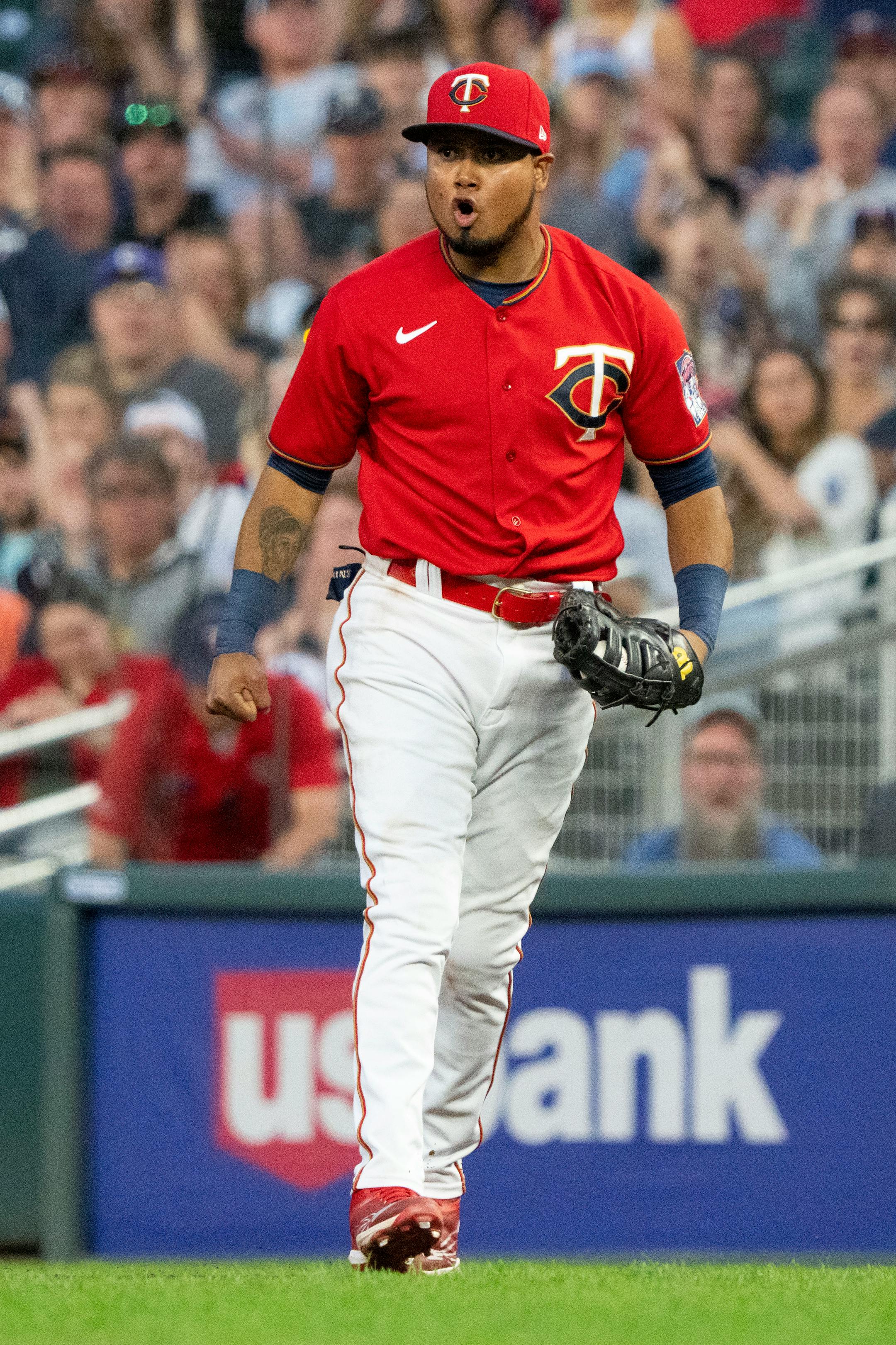 Minnesota Twins first baseman Luis Arraez (2) celebrates completing a double play.