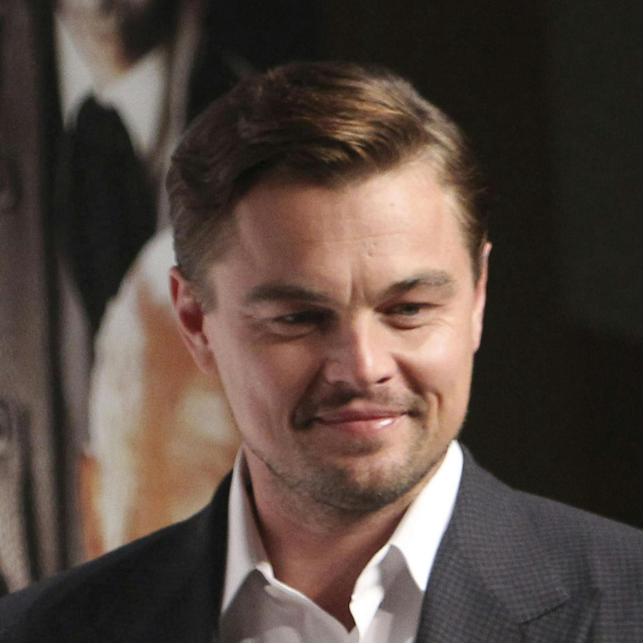 In this Saturday, March 2, 2013 photo, actor Leonardo DiCaprio poses for a photo call during a press conference to promote his new film "DJango Unchained" in Tokyo. The Hollywood film "Django Unchained" has been pulled from Chinese theaters on its opening day, despite weeks of promotion for director Quentin Tarantino's violent slave-revenge saga. Movie theaters throughout China said Thursday, April 11, 2013 that they were ordered to suspend the film. (AP Photo/Junji Kurokawa)