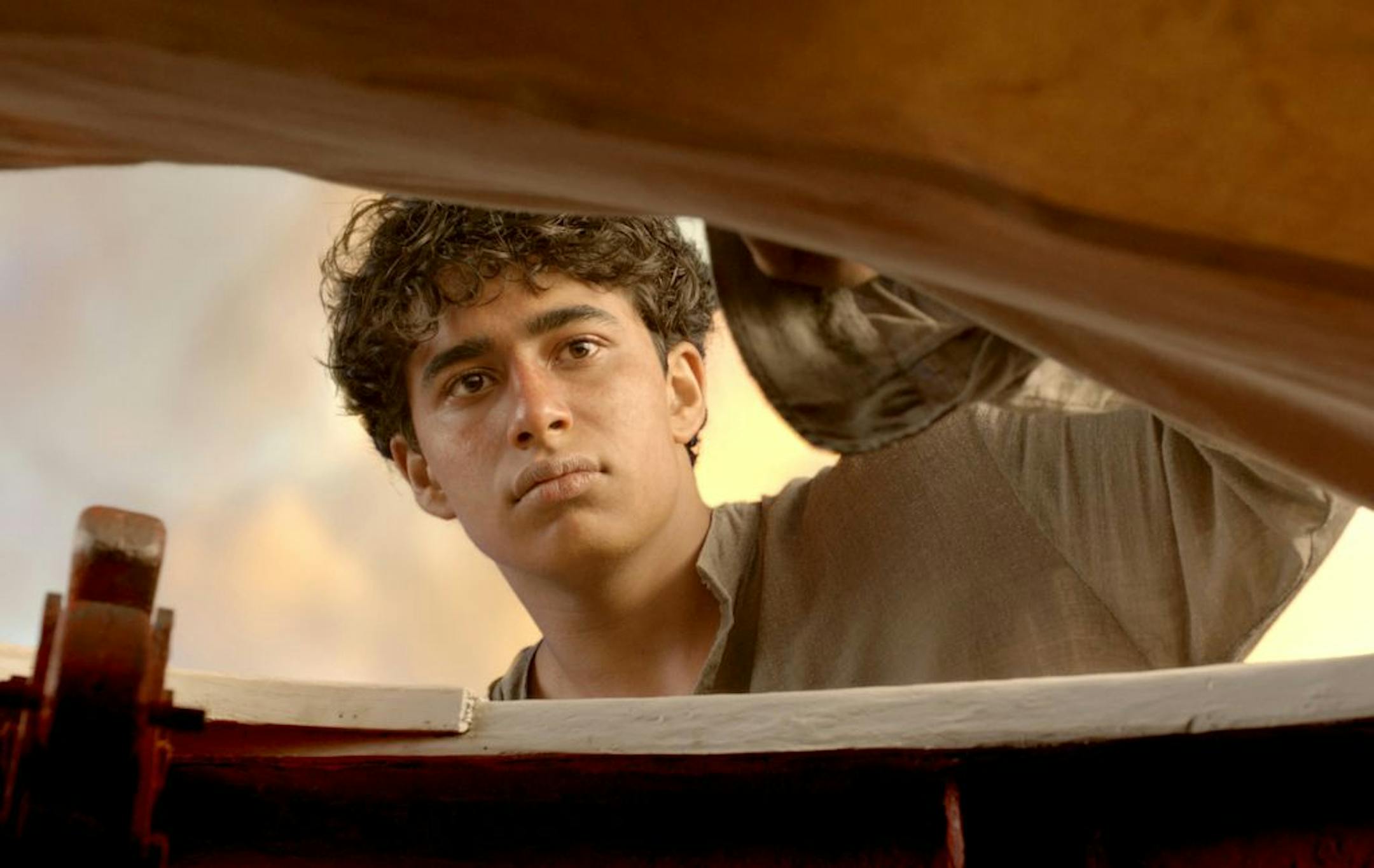 This film image released by 20th Century Fox shows Suraj Sharma as Pi Patel in a scene from "Life of Pi."