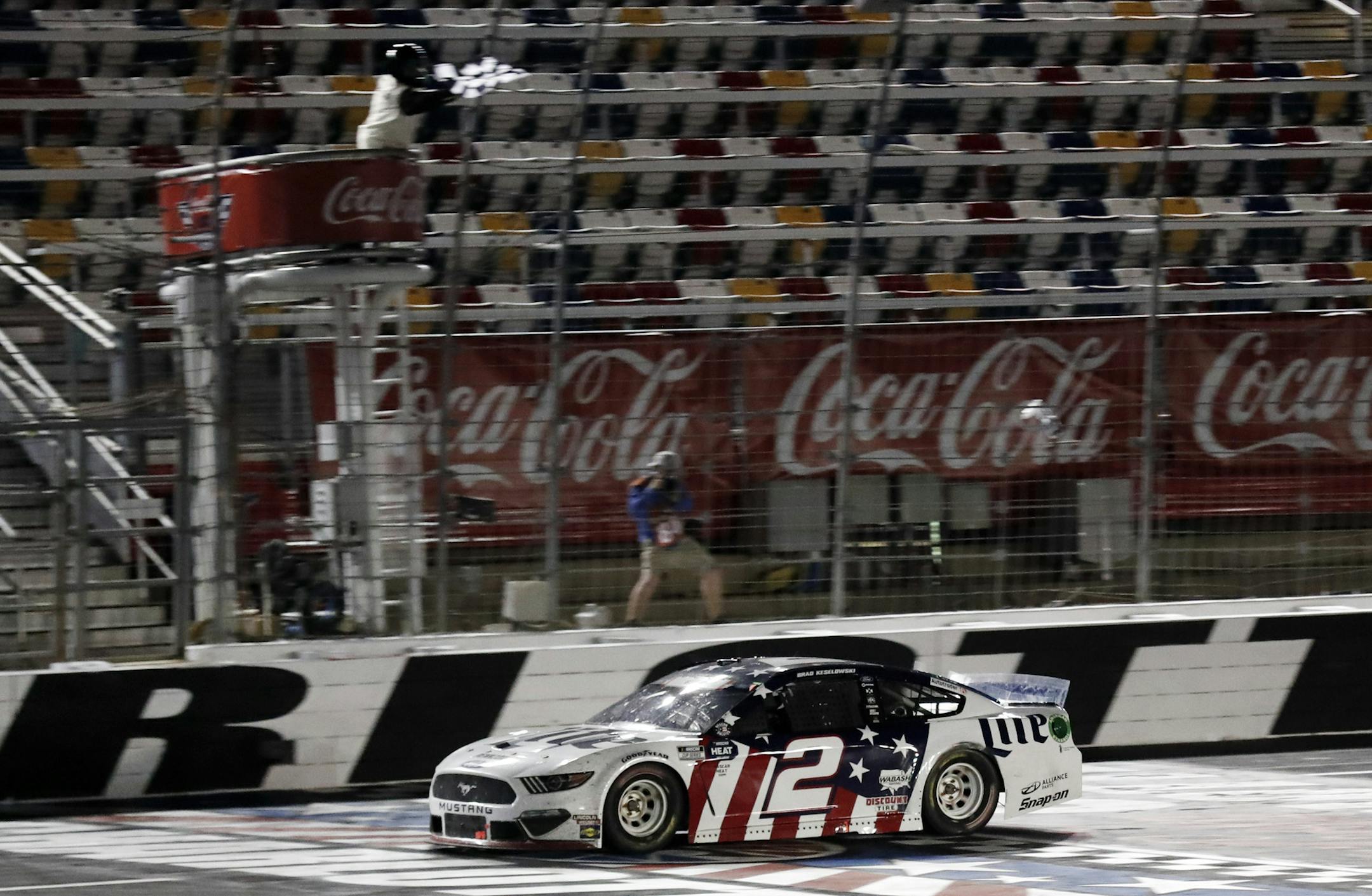 Brad Keselowski wins the NASCAR Cup Series auto race at Charlotte Motor Speedway early Monday, May 25, 2020, in Concord, N.C. (AP Photo/Gerry Broome)
