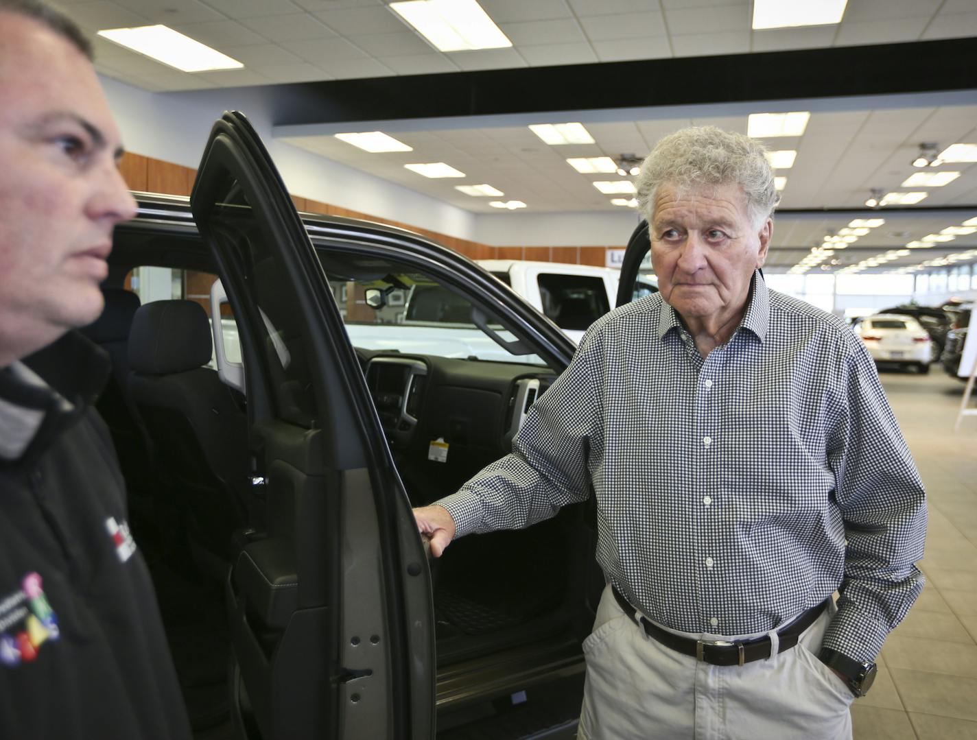 After selling cars for five decades, Ted Weinberg, 81, retired from sales last year, only to discover that retirement wasn't all it was cracked up to be. So he has launched a free program in which he accompanies prospective car buyers as they shop and he does the haggling for them. He also makes sure that the salesman doesn't talk them into buying something they don't need or can't afford. He chatted with client Harry Maron at a car dealership in Golden Valley, Minn., on Thursday, April 24, 2014