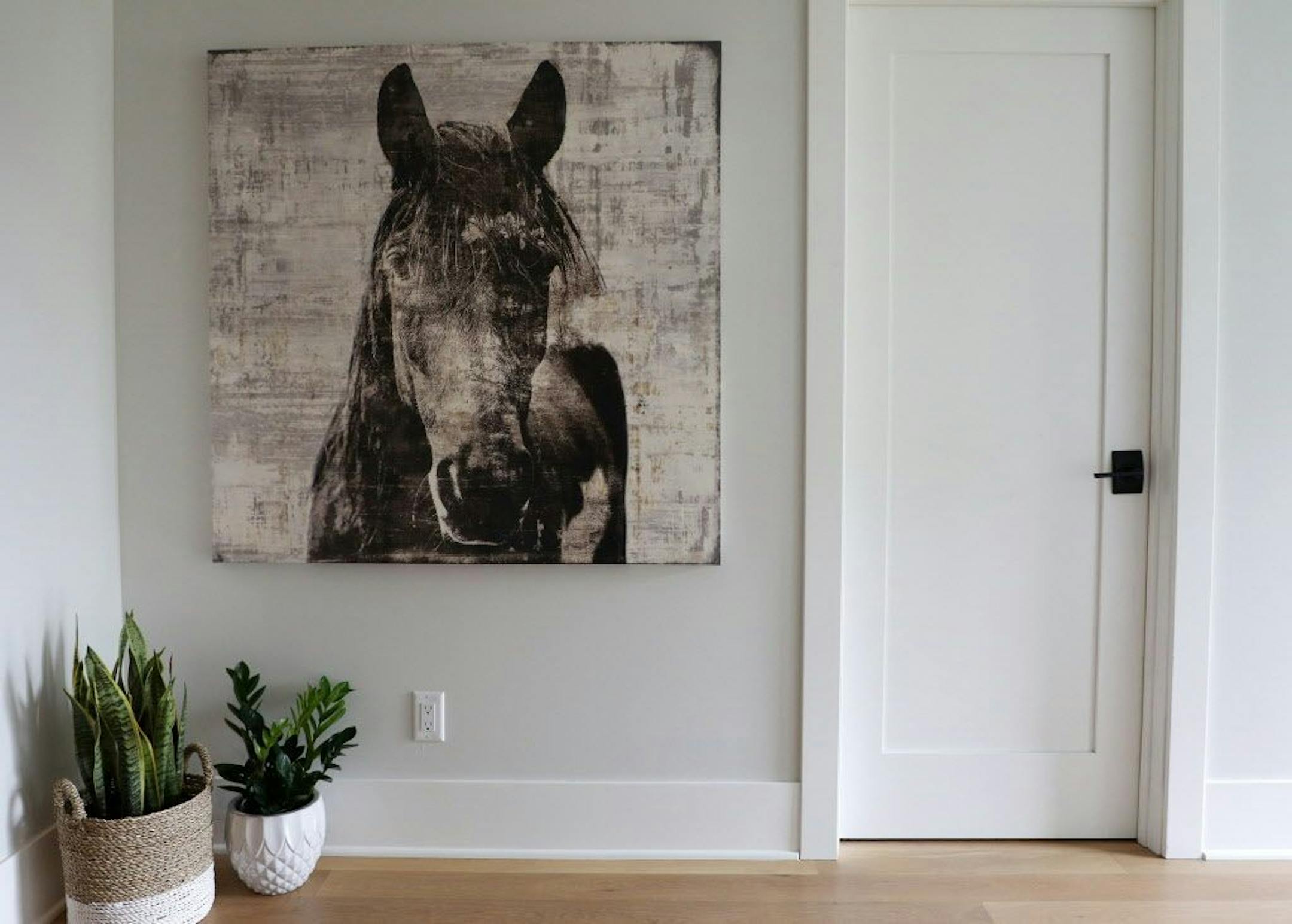 Artwork in an upstairs hallway.