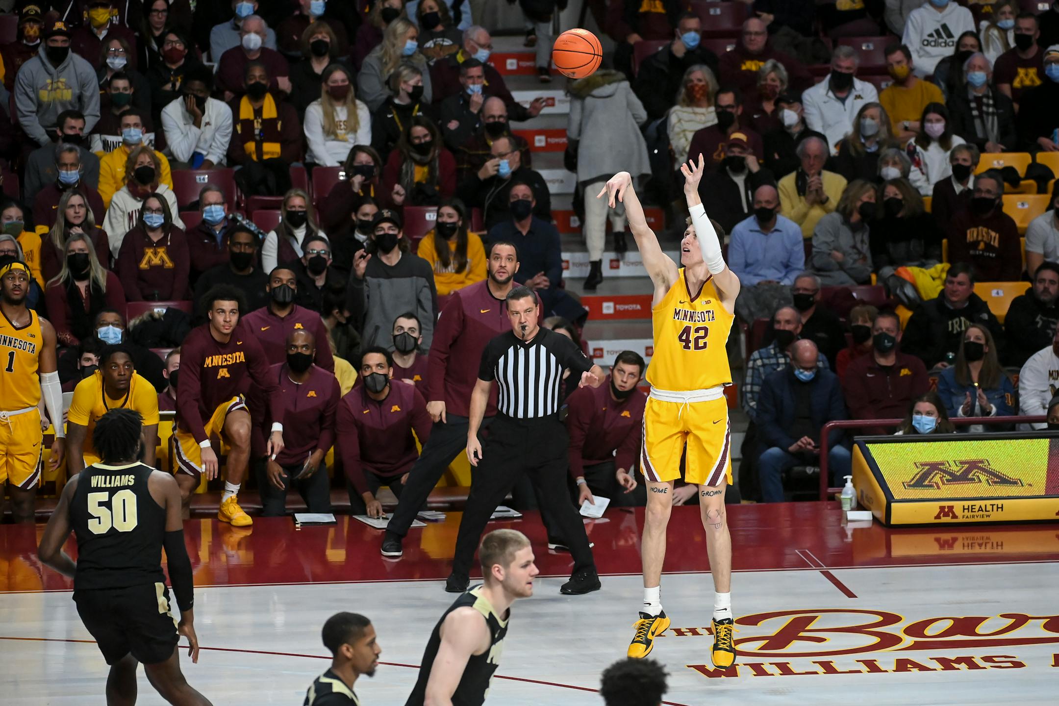 Minnesota Gophers center Treyton Thompson (42) scores 3-pointer off the bench during the second half of an NCAA men's basketball game between Minnesota and Purdue at Williams Arena in Minneapolis, Minn.