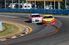 Joey Logano passed Kevin Harvick on the last turn on the way to winning a NASCAR Sprint Cup series auto race at Watkins Glen International on Sunday.