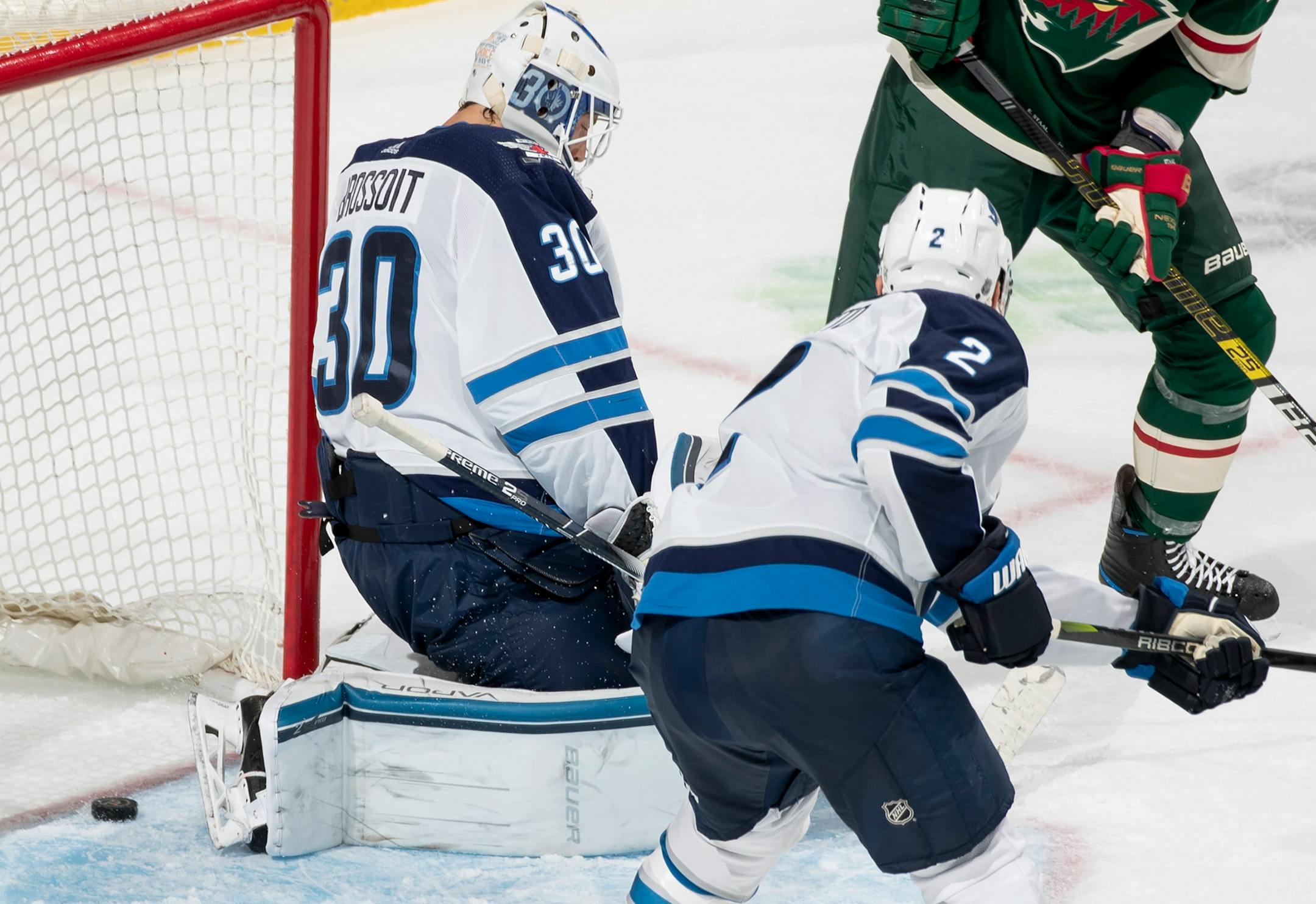 Mats Zuccarello (not in picture) of the Minnesota Wild got the puck past Winnipeg Jets goalie Laurent Brossoit for a goal in the third period. ] CARLOS GONZALEZ • cgonzalez@startribune.com – St. Paul, MN – September 29, 2019, Xcel Energy Center, NHL Pre Season Hockey, Minnesota Wild vs. Winnipeg Jets