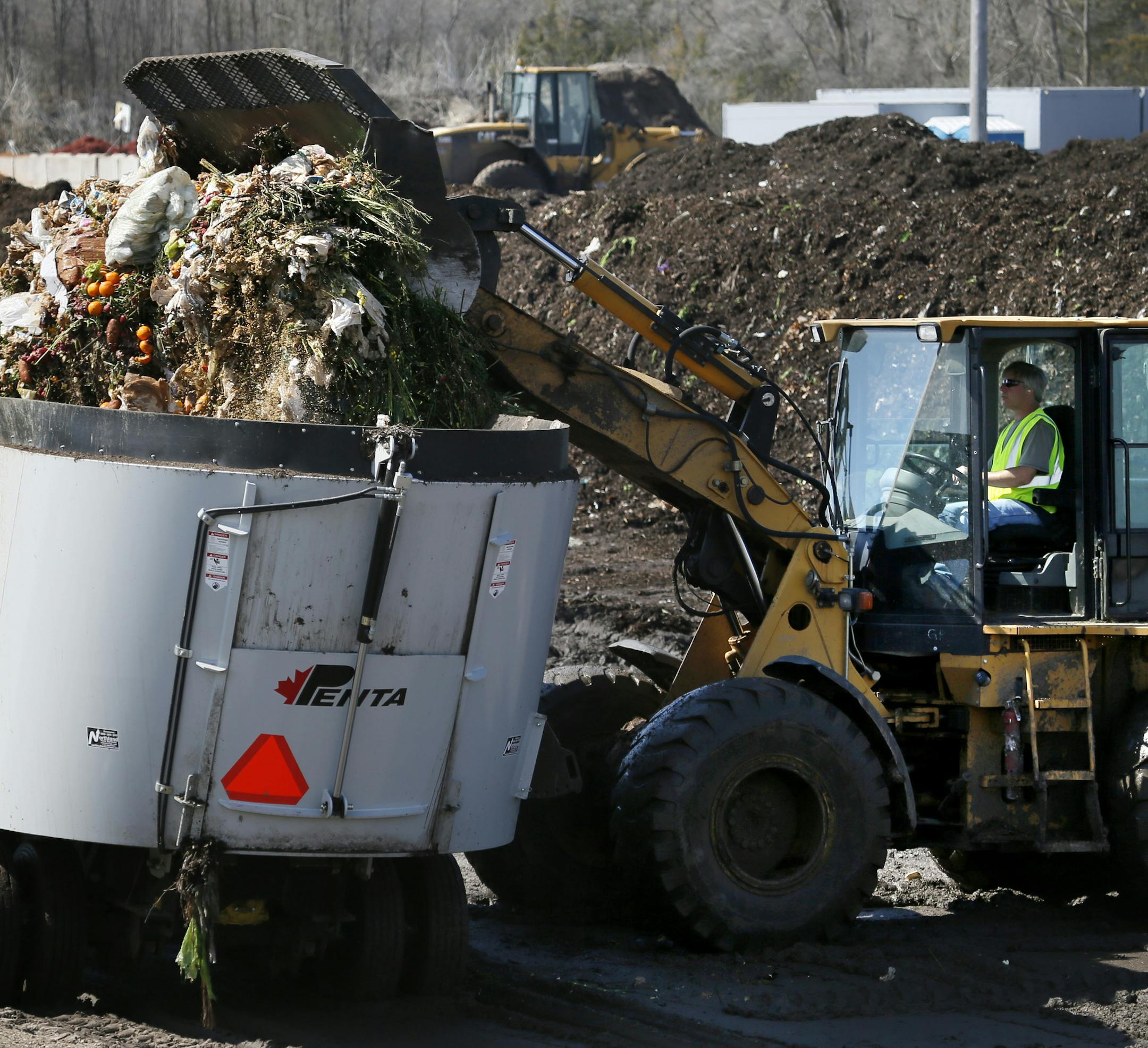 A decade after Hennepin County began pilot programs to build organics recyling among residents, just 11 cities in the county offer those programs. The number is expected to reach an even dozen next week, when the St. Louis Park City Council votes on a plan to start organics recycling this fall. Here, food waste is added to a hopper for mixing with yard waste at Organics Recycling Development in Rosemount.] BRIAN PETERSON ‚Ä¢ brianp@startribune.com Rosemount, MN - 05/07/2013