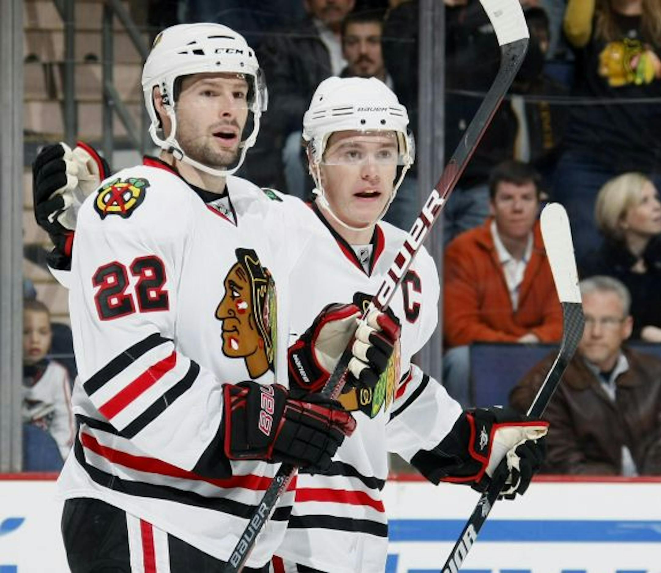 COLUMBUS, OH - JANUARY 16: Troy Brouwer #22 of the Chicago Blackhawks celebrates a first period goal with Jonathan Toews #19 while playing the Columbus Blue Jackets on January 16, 2010 at Nationwide Arena in Columbus, Ohio.