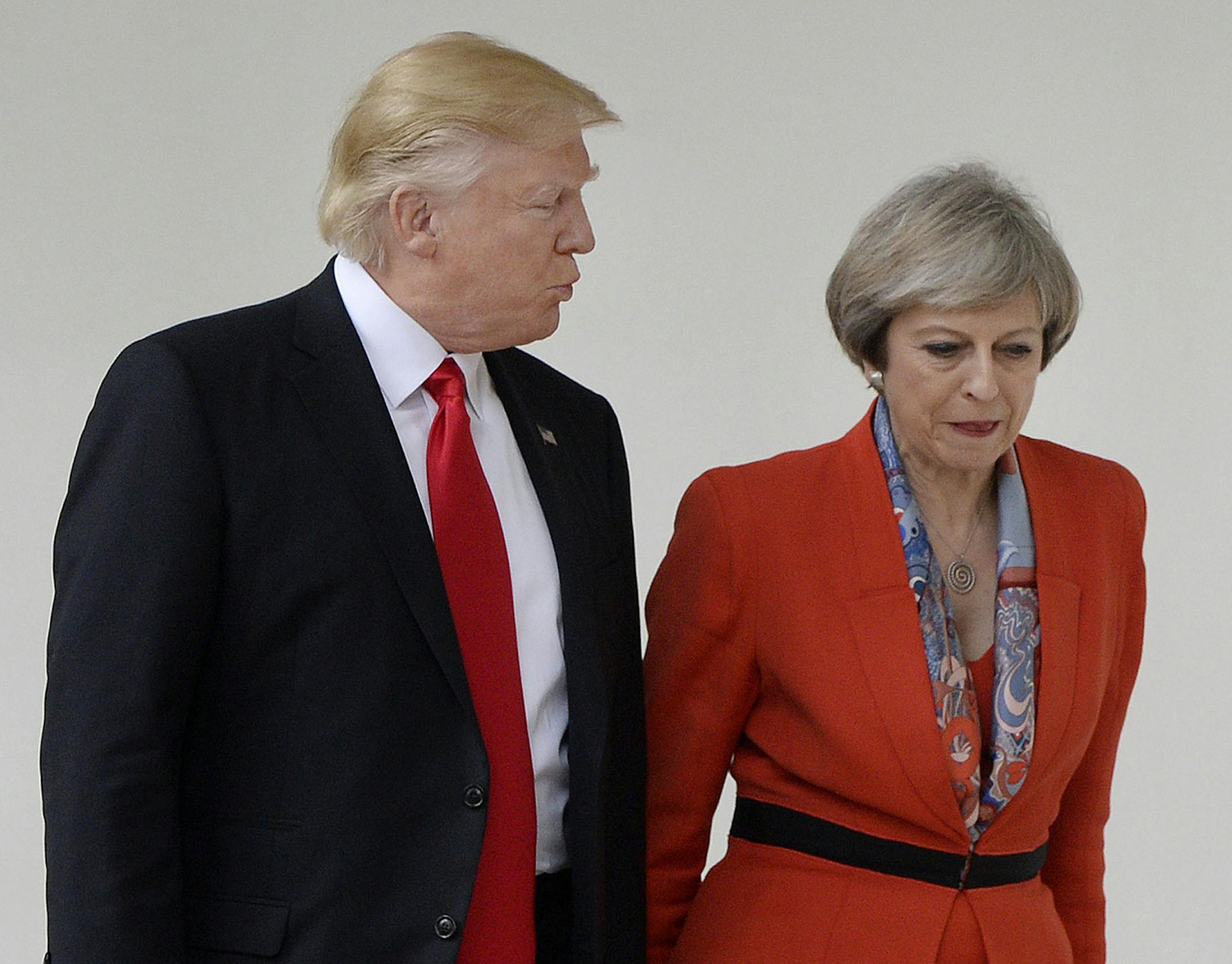 US President Donald Trump and UK Prime Minister Teresa May walk the colonade of the White House Friday, Jan. 27, 2017 in Washington, D.C. (
Olivier Douliery/Abaca Press/TNS) ORG XMIT: 1196676