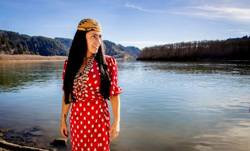 photo of author Amy Bowers Cordalis in front of the Klamath River