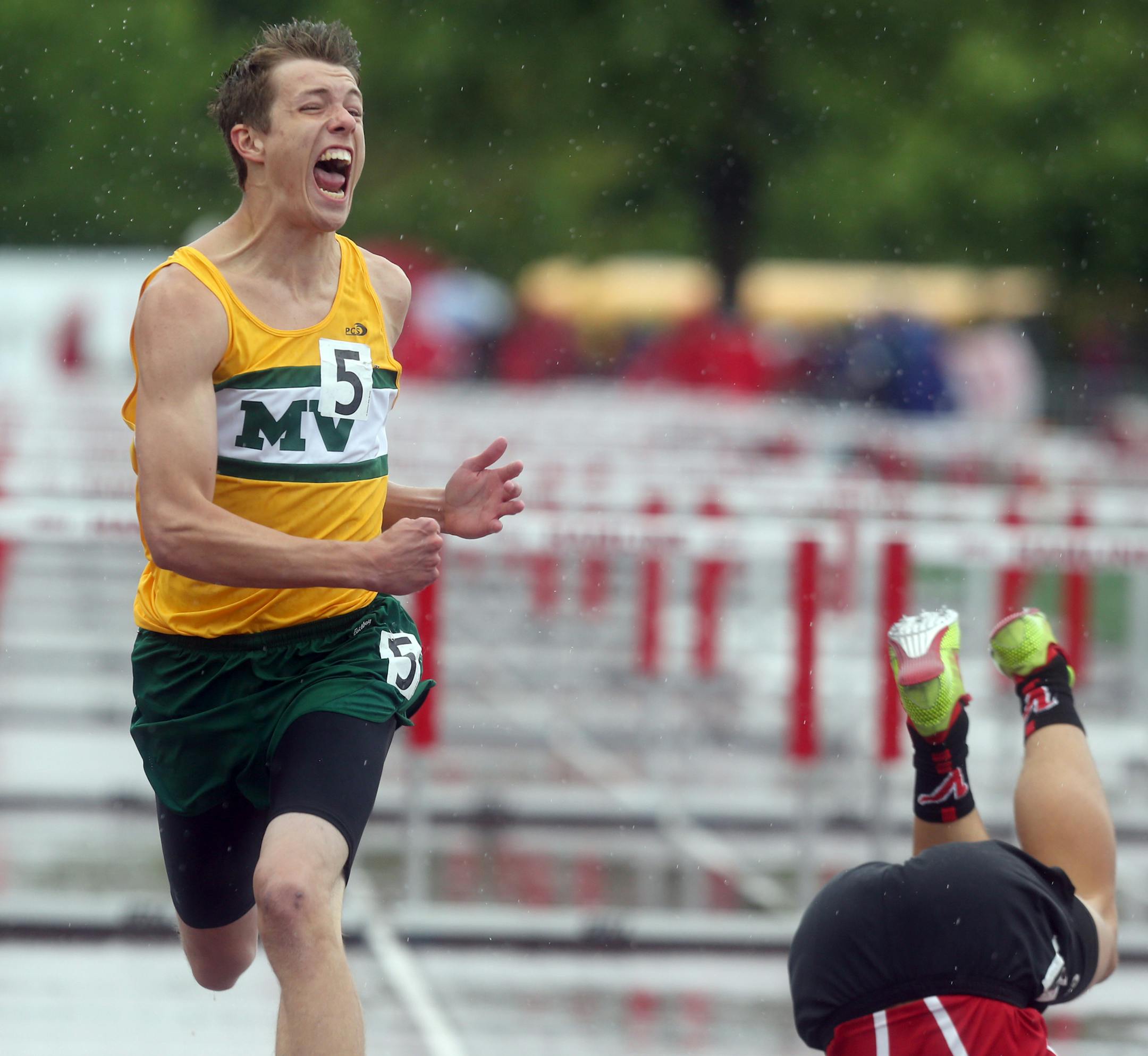 Mounds View's Matt Baker celebrated after winning in the 110 meter hurdles. ] (KYNDELL HARKNESS/STAR TRIBUNE) kyndell.harkness@startribune.com During the Class 2A state track and field meet at Hamilne University in St Paul, Min. Saturday, June 7, 2014.
