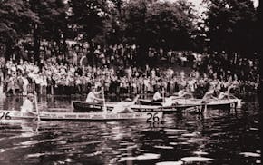 July 14, 1960 ANOK RACERS OFF--Four canoe teams strain down river at start today group in the annual Minneapolis Aquatennial canoe derby. The race run