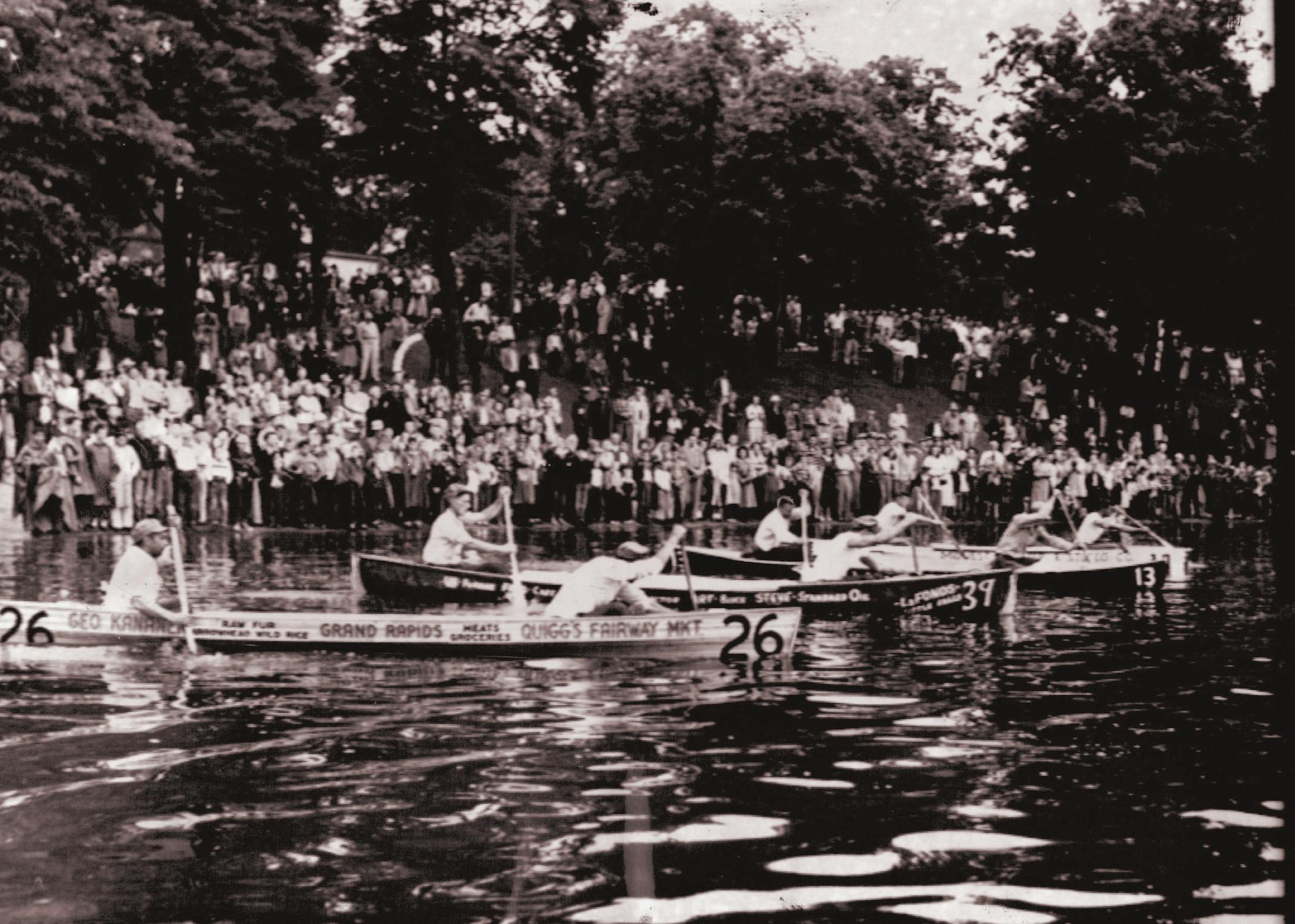 July 14, 1960 ANOK RACERS OFF--Four canoe teams strain down river at start today group in the annual Minneapolis Aquatennial canoe derby. The race runs down the Mississippi river rom Bemidji, Minn., to the Franklin avenue bridge, where the final sprint is scheduled to end next Friday. In canoe 26 are Bob Tibbetts and Pat Murphy, Ball Club, Minn.; canoe 39, Harlow J. Thompson and Richard L. Peck, Deer River, Minn.; canoe 13, Tom Estes and Eugene Jensen, Minneapolis, last year's winners, and behind them, canoe 30, Irvin C. and Floyd B. Peterson, Minneapolis brothers.-Jack Connor Story on page 15.  Minneapolis Star Tribune ORG XMIT: MER4a61e478e43baa64994ab9127cbac
