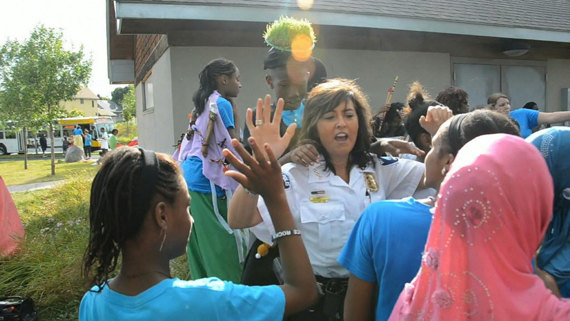 Minneapolis Police Chief Janée Harteau mixed with revelers at the Heritage Park National Night Out in north Minneapolis Tuesday night.