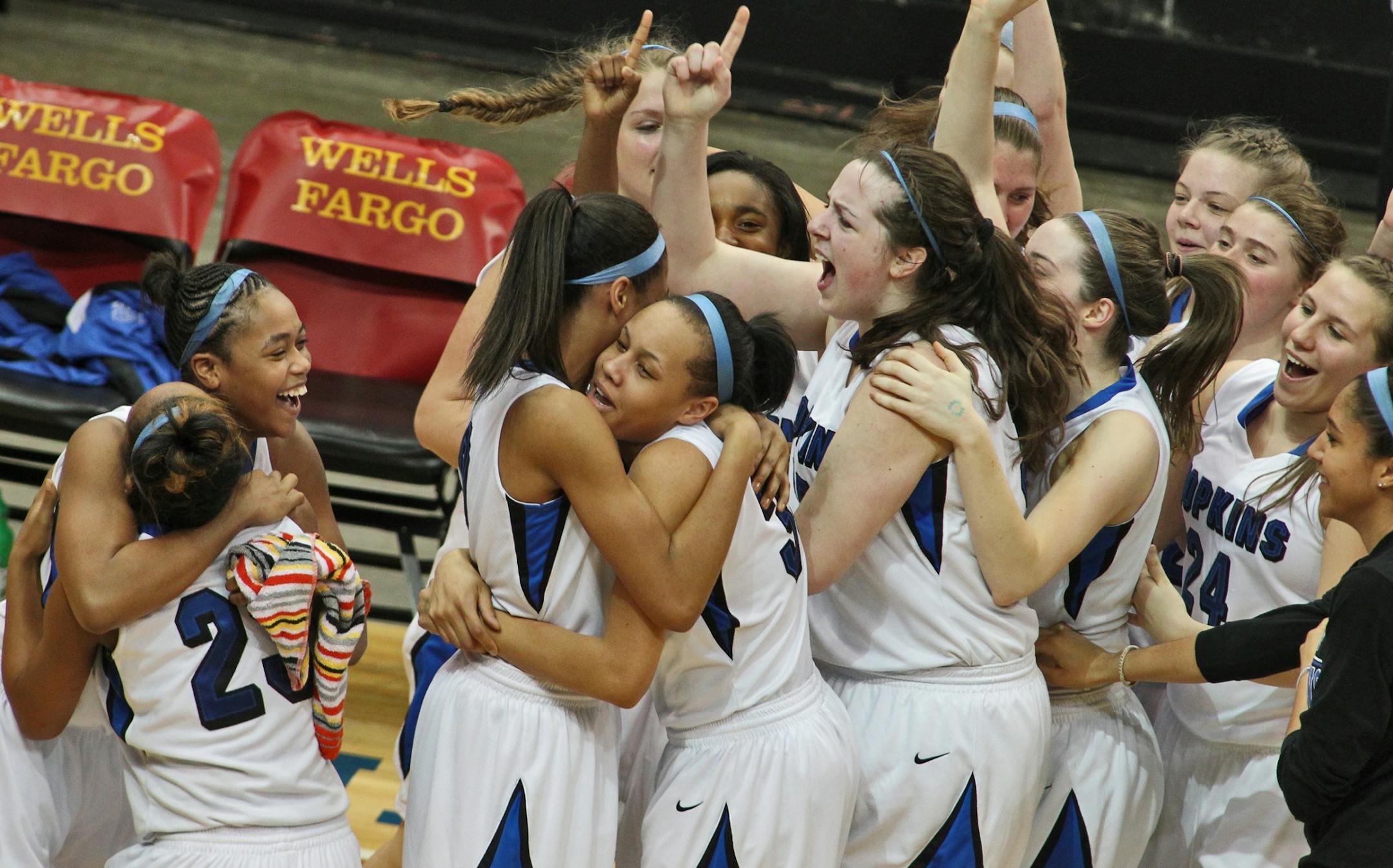Hopkins players celebrated their victory at the end of the game.