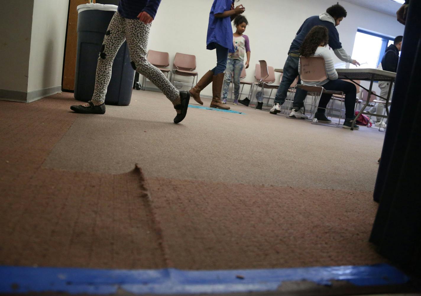 Torn and worn carpeting in a room at Hancock Recreation Center in St. Paul was held together with duct tape in December 2016. (DAVID JOLES STARTRIBUNE)djoles@startribune.com