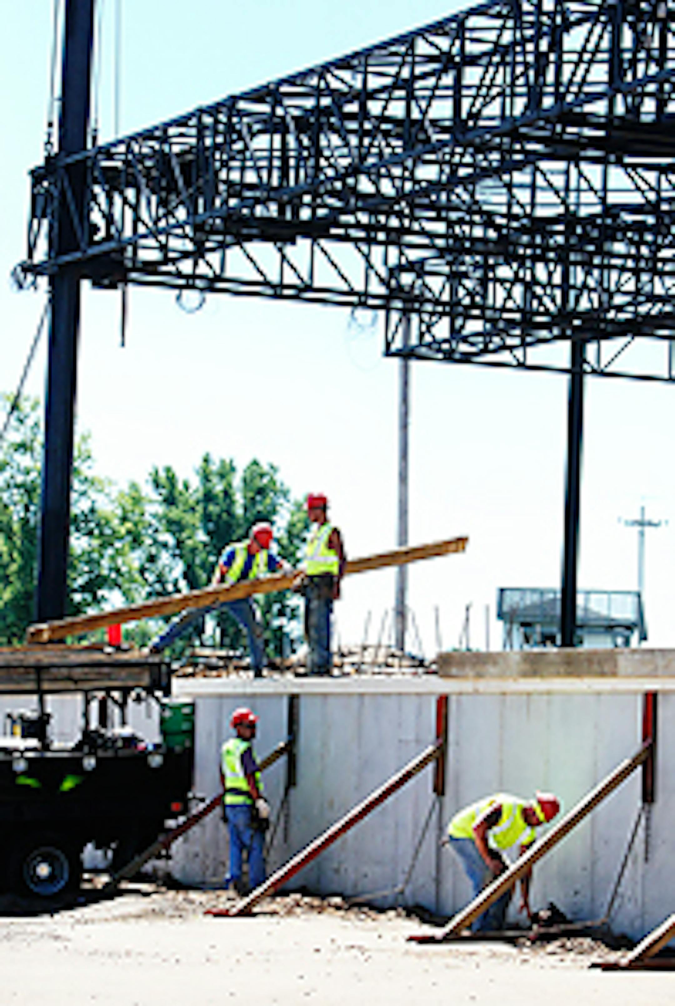 Workers installed a concrete floor for the Somerset Amphitheater's music stage