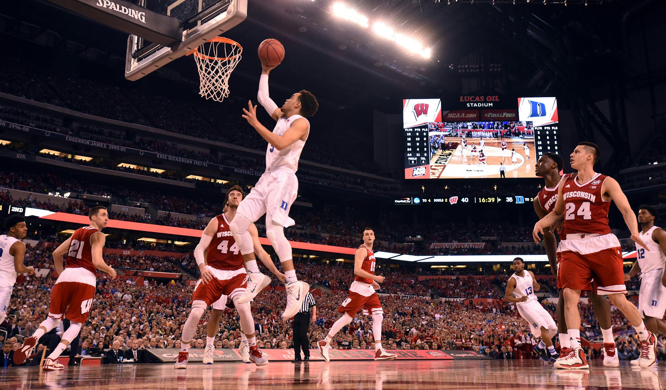 Duke's Tyus Jones (5) drives to the basket during the second half of the NCAA National Championship game on Monday, April 6, 2015, at Lucas Oil Stadium in Indianapolis. (Chuck Liddy/Raleigh News & Observer/TNS)