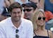 In this July 2, 2011, file photo, Chicago Bears quarterback Jay Cutler, left, and his wife Kristin Cavallari watch the Chicago Cubs play the Chicago W