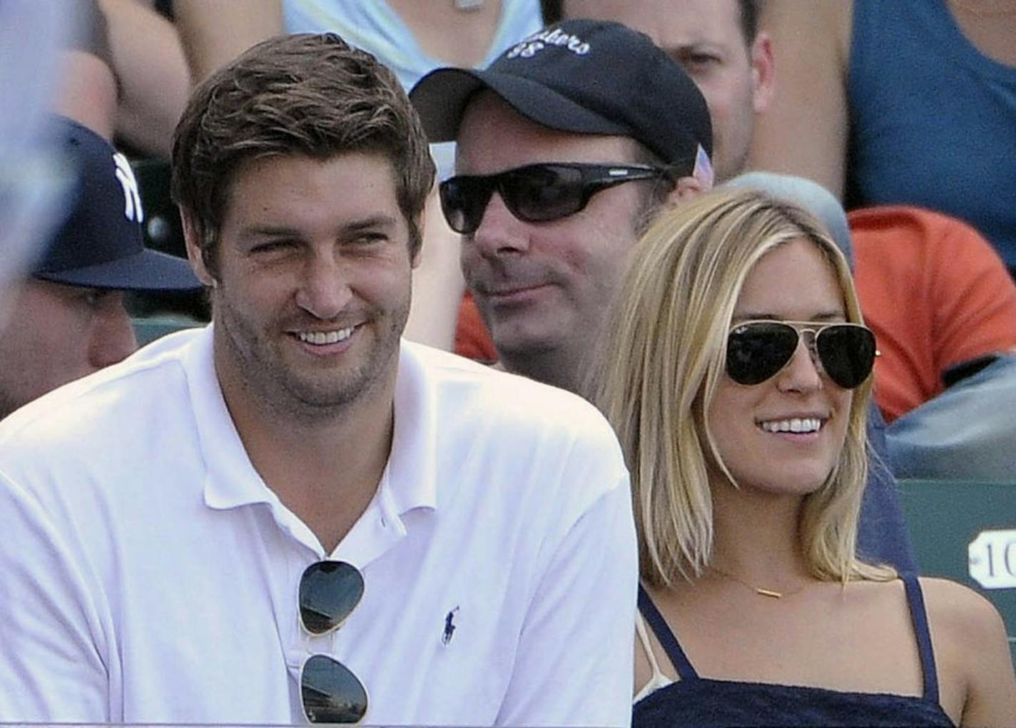 In this July 2, 2011, file photo, Chicago Bears quarterback Jay Cutler, left, and his wife Kristin Cavallari watch the Chicago Cubs play the Chicago White Sox in Chicago.