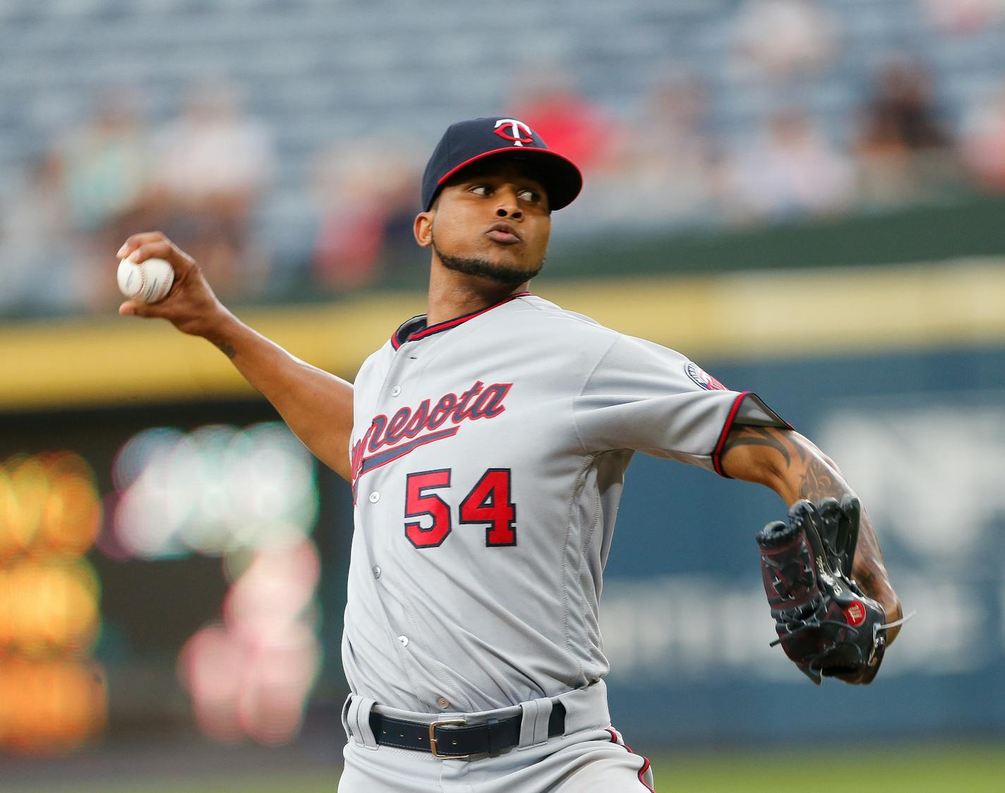 Minnesota Twins starter Ervin Santana delivers a pitch during the first inning of a baseball game against the Atlanta Braves in Atlanta, Tuesday, Aug. 16, 2016, (AP Photo/John Bazemore)