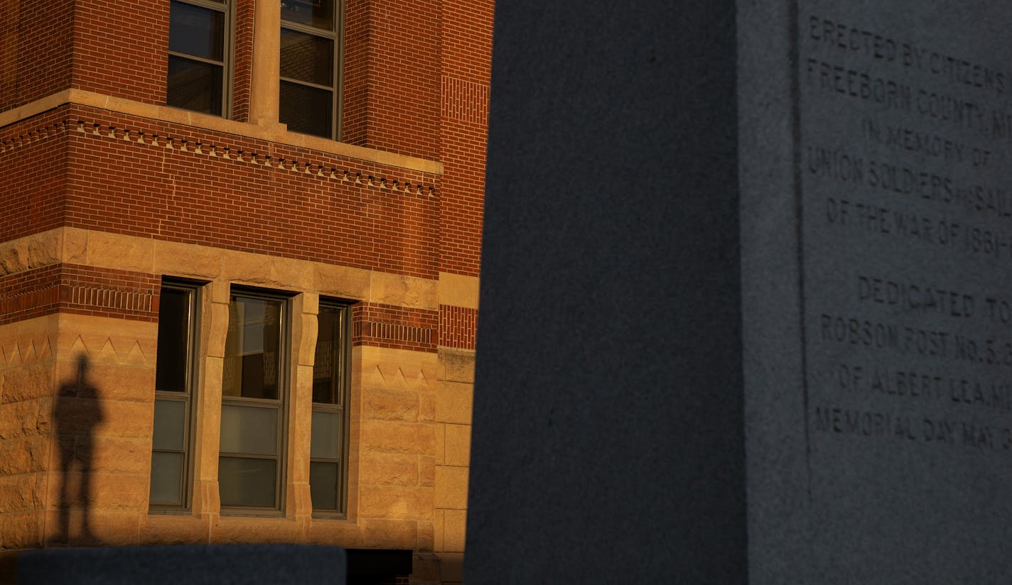 The shadow of a statue commemorating the Union Soldiers and Sailors of the war of 1861-65 at the Freeborn County District Court in Albert Lea, MN. ] CARLOS GONZALEZ • cgonzalez@startribune.com – Albert Lea, MN – June 17, 2020, Albert Lea was named for a Confederate officer. As national lawmakers debate stripping Confederate names from military bases and people attack Confederate symbols, Albert Lea is not having any kind of public reckoning of its own.