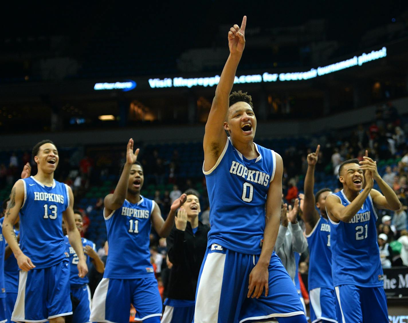 Hopkins guard Ishmael El Amin (0) and teammates celebrated their 64-55 victory over Lakeville North in the 4A championship game Saturday night. ] (AARON LAVINSKY/STAR TRIBUNE) aaron.lavinsky@startribune.com Lakeville North played Hopkins in the Class 4A boysÕ basketball championship game on Saturday, March 12, 2016 at Target Center in Minneapolis, Minn.