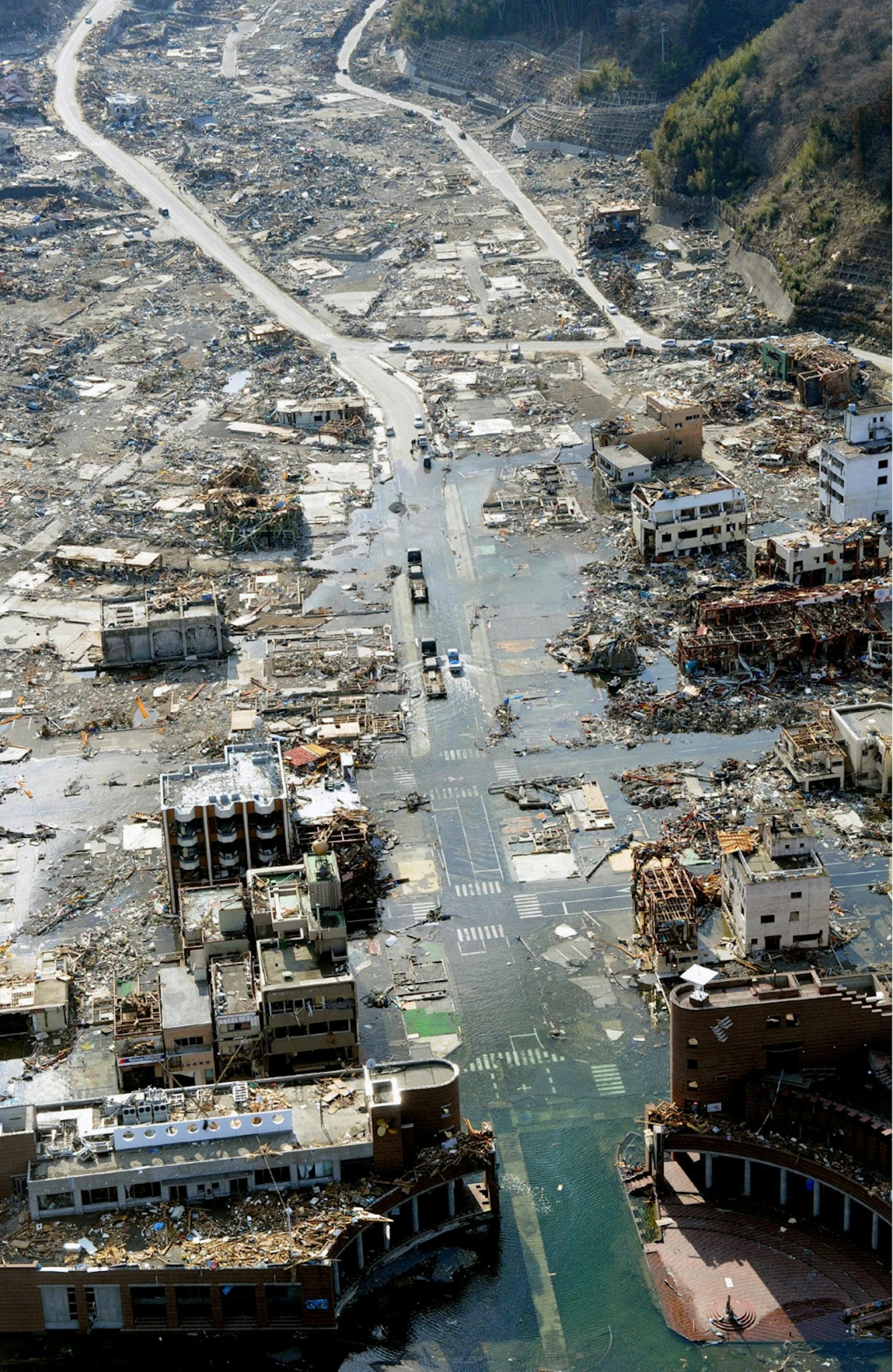 Flood water stays in the middle of the tsunami-stricken town of Onagawa in Miyagi Prefecture Saturday, March 19, 2011, eight days after the town was slammed by a powerful quake-triggered tsunami. (AP Photo/Kyodo News) JAPAN OUT, MANDATORY CREDIT, NO LICENSING IN CHINA, HONG KONG, JAPAN, SOUTH KOREA AND FRANCE