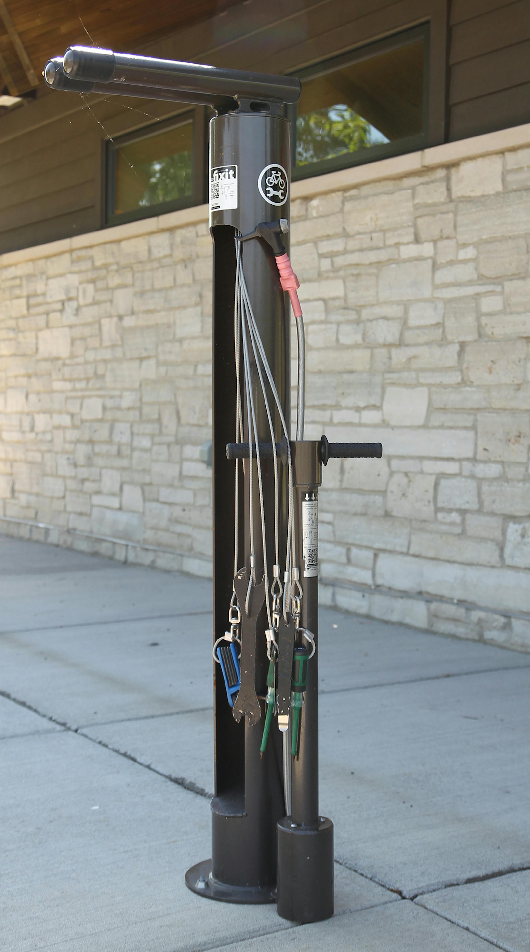 A bicycle repair station is among the amenities at the new Swing Bridge Trailhead.