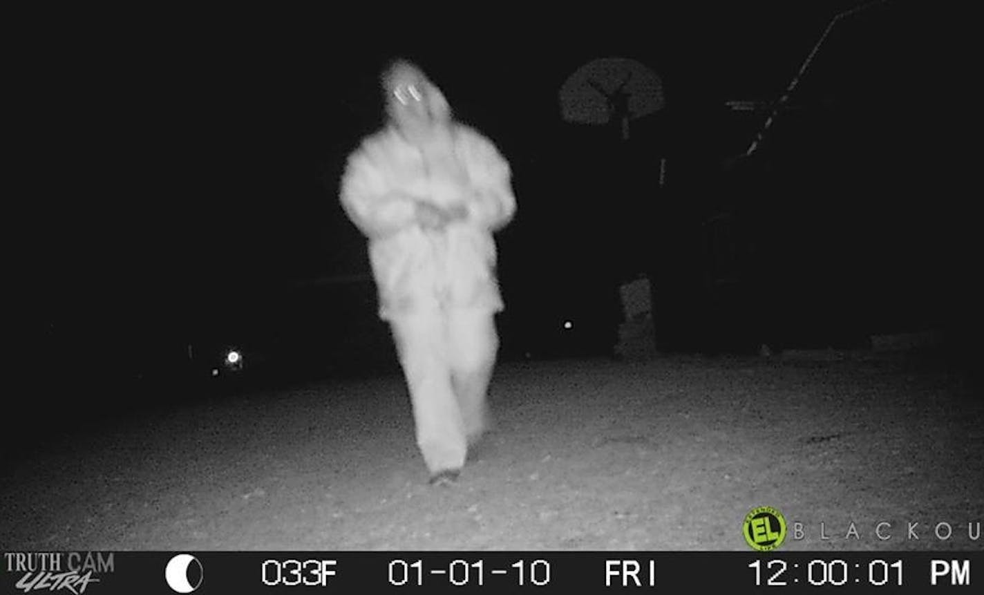 This trail camera image shows someone police suspect is responsible for poisoning dogs.