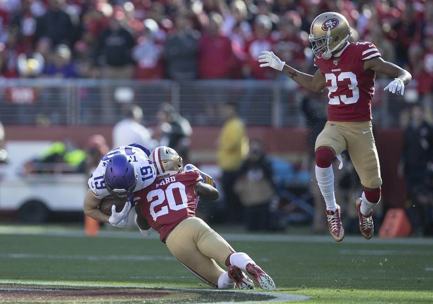 San Francisco 49ers free safety Jimmie Ward (20) tackled Minnesota Vikings wide receiver Adam Thielen (19) in the first quarter just short of a first down .