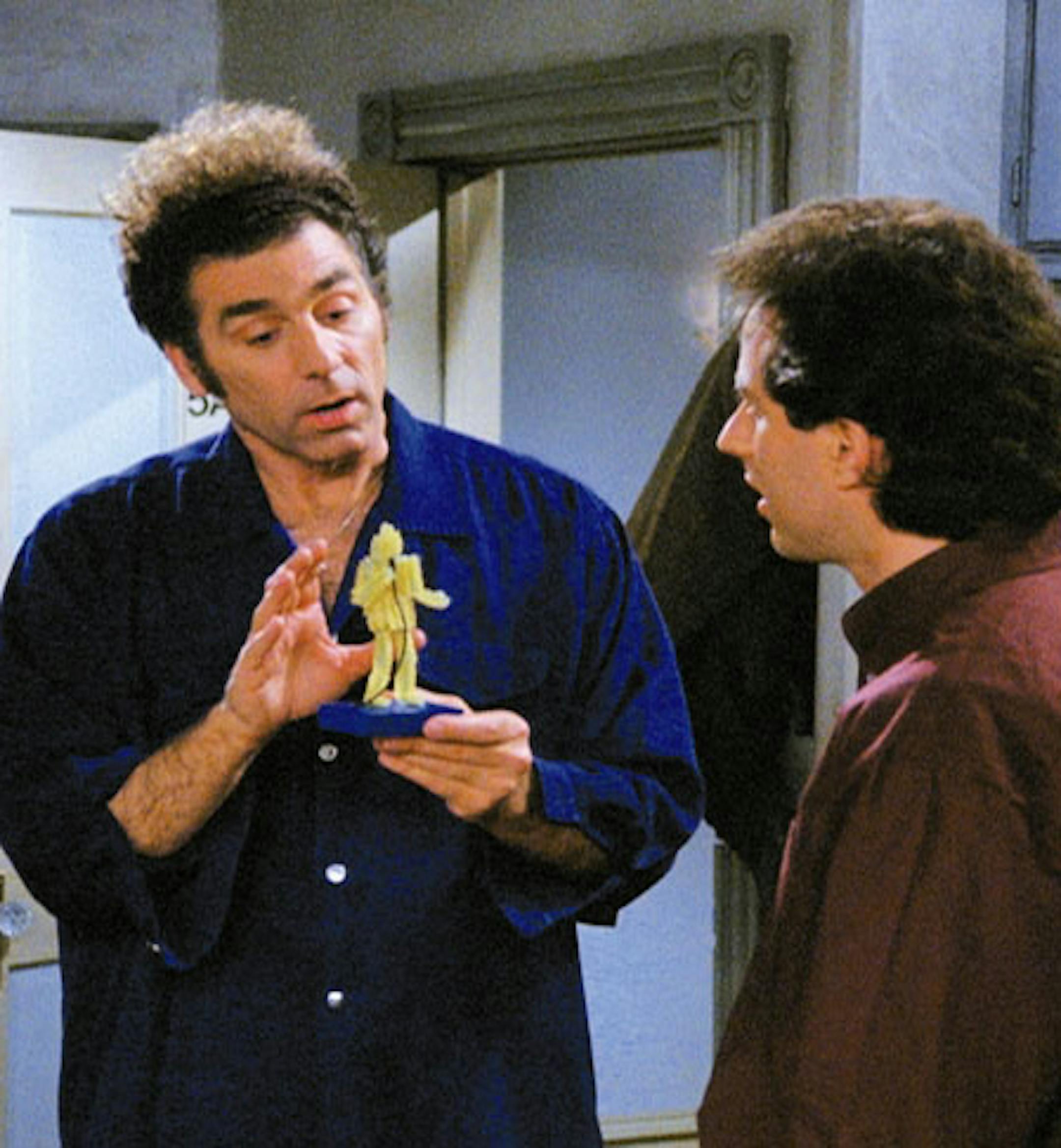 In this 1998 photo, released by Castle Rock Entertainment, from the comedy series "Seinfeld," Kramer, played by Michael Richards, shows Jerry his "Fusilli Jerry." The episode is part of a 4-disc DVD set of the show's sixth season, released Nov. 22, 2005, along with a season five set. (AP Photo/Copyright 1998, Castle Rock Entertainment) ORG XMIT: NYET348