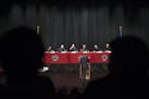 The Minnesota Supreme Court listens to arguments in a case at Lakeville North High School.