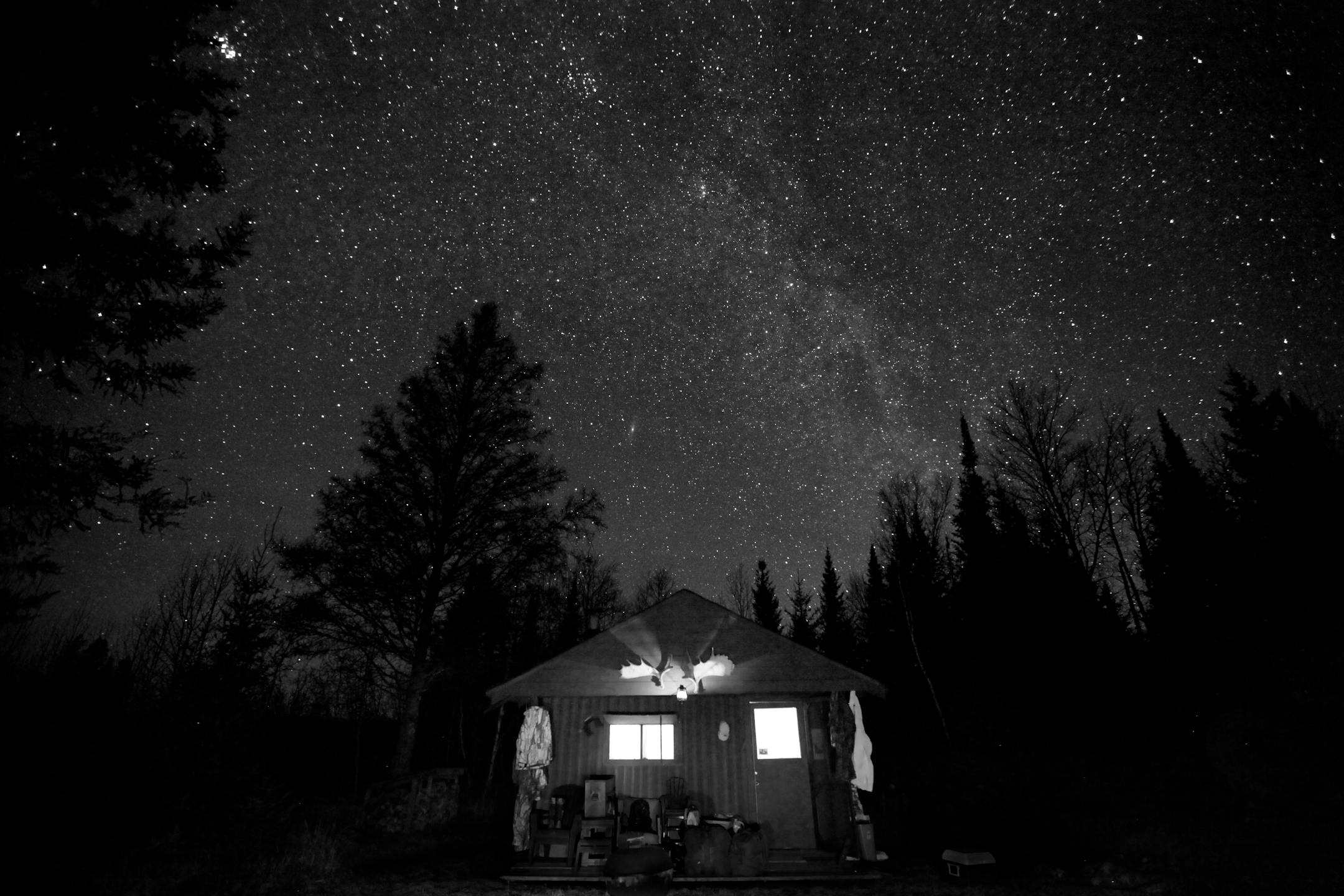 It makes you feel so small. You look up into night sky, 20 miles from the nearest town, 10 miles from the nearest power line and the view is stunning. After leaving the sparkling skyline but muted constellations of the city behind, It's one of the more inspiring moments in deer camp.
We come from many locations and leave our lives behind. We sleep with mice, honor the hunt, celebrate meals and share stories. But, it's that long walk in the dark, before daybreak, settling into a tree stand and lo
